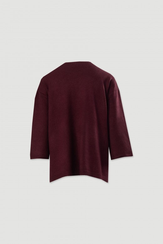 Camisola de malha fluda com botes nas mangas