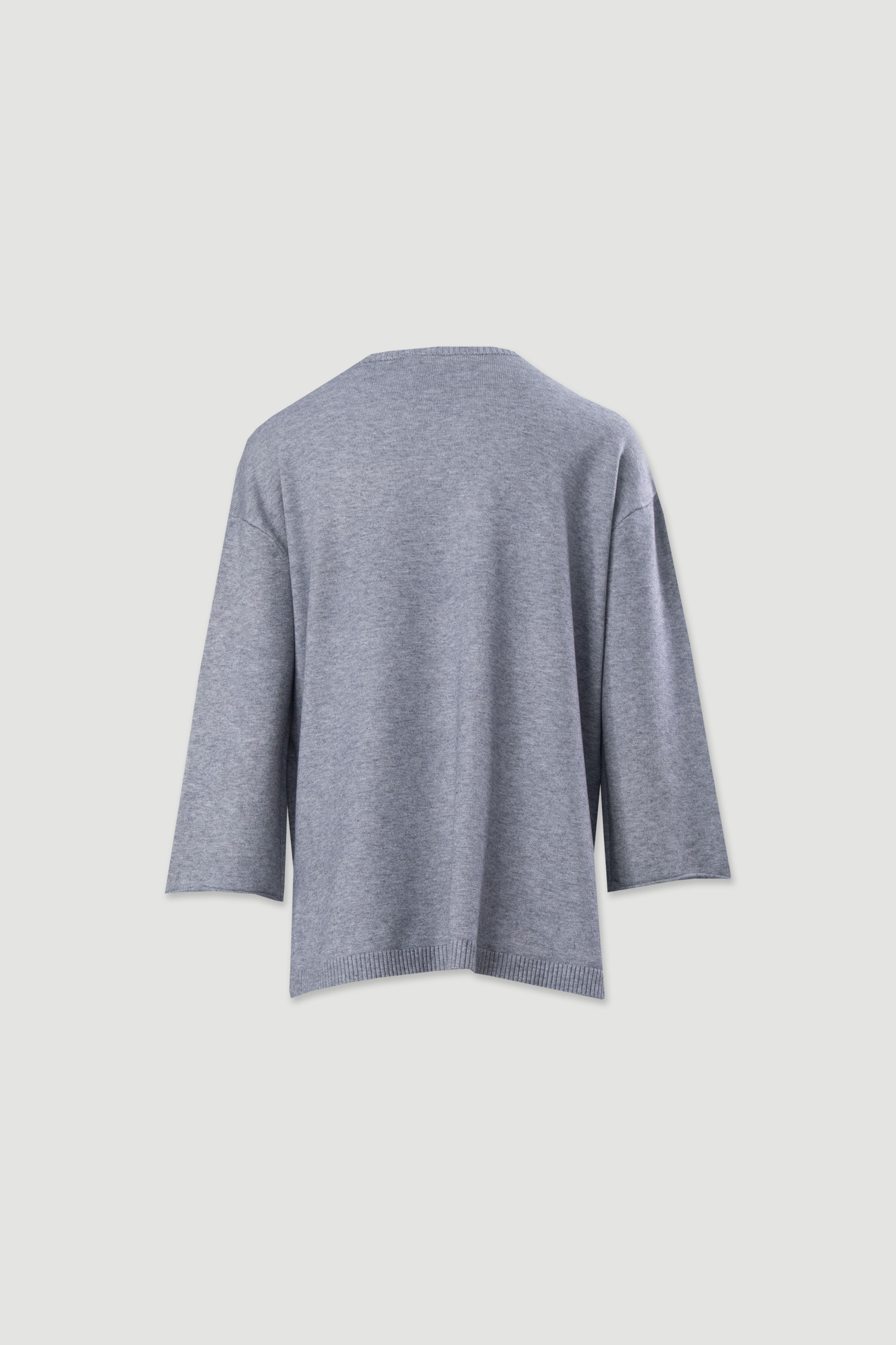 Camisola de malha fluída com botões nas mangas