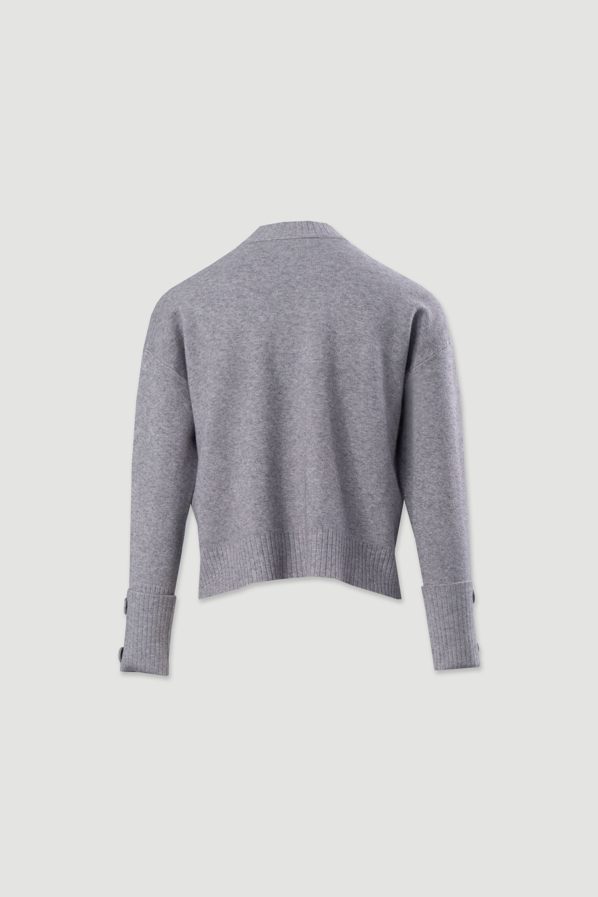 Pull en maille avec boutons aux poignets