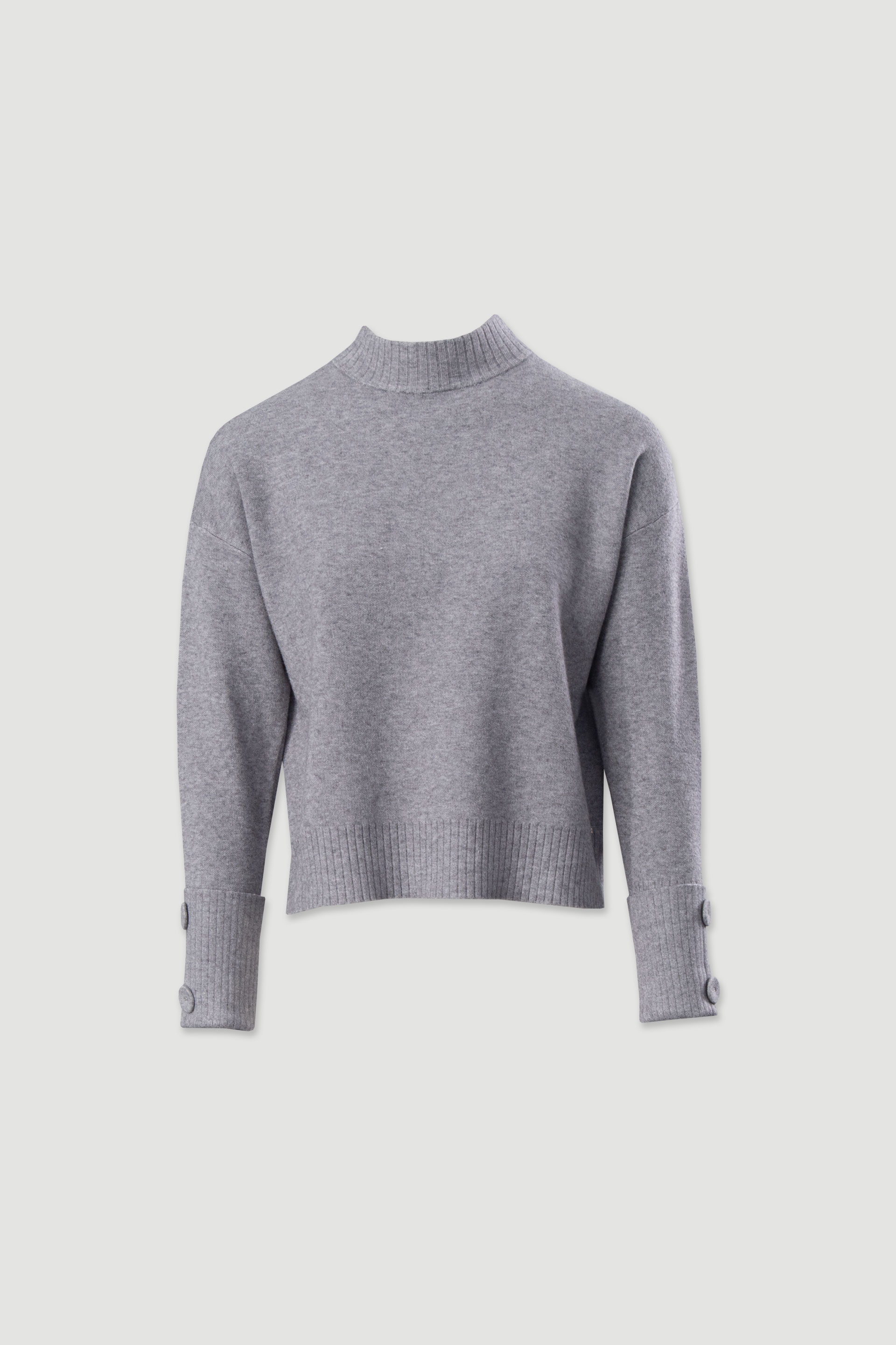 Pull en maille avec boutons aux poignets