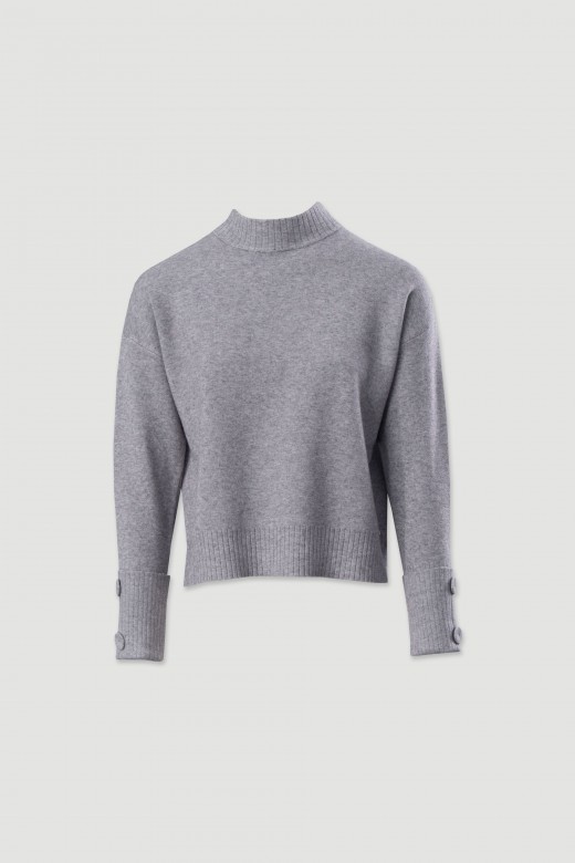 Pull en maille avec boutons aux poignets