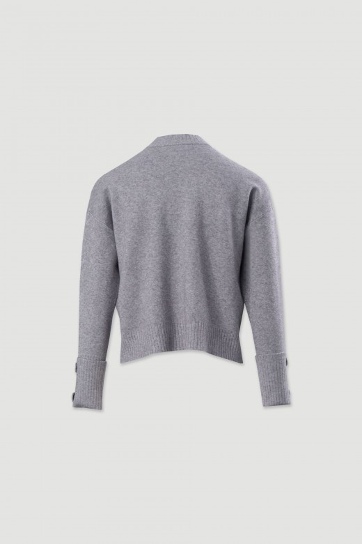 Pull en maille avec boutons aux poignets
