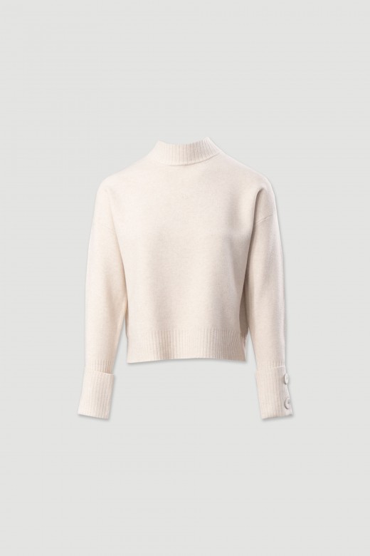 Pull en maille avec boutons aux poignets