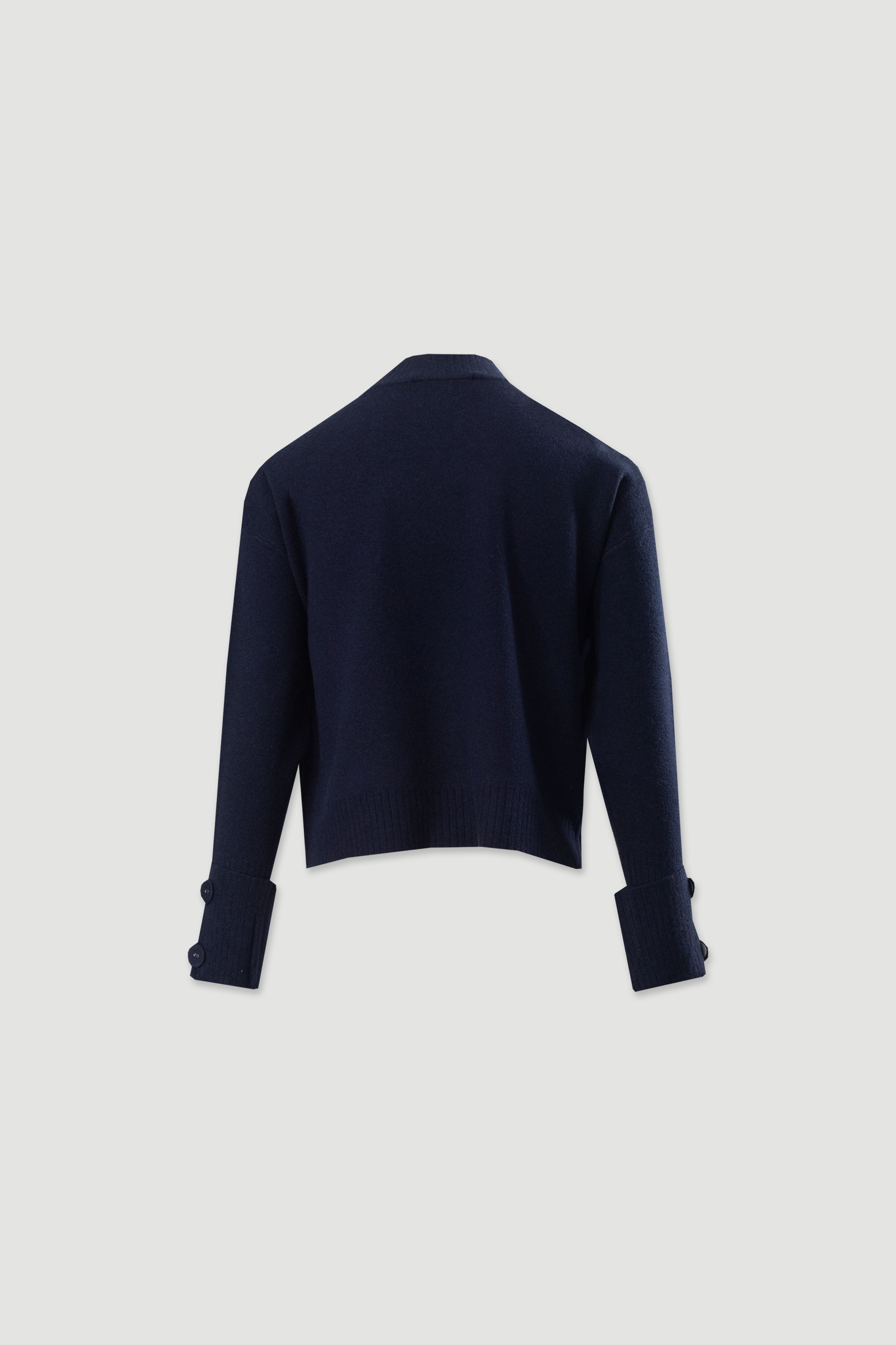 Pull en maille avec boutons aux poignets