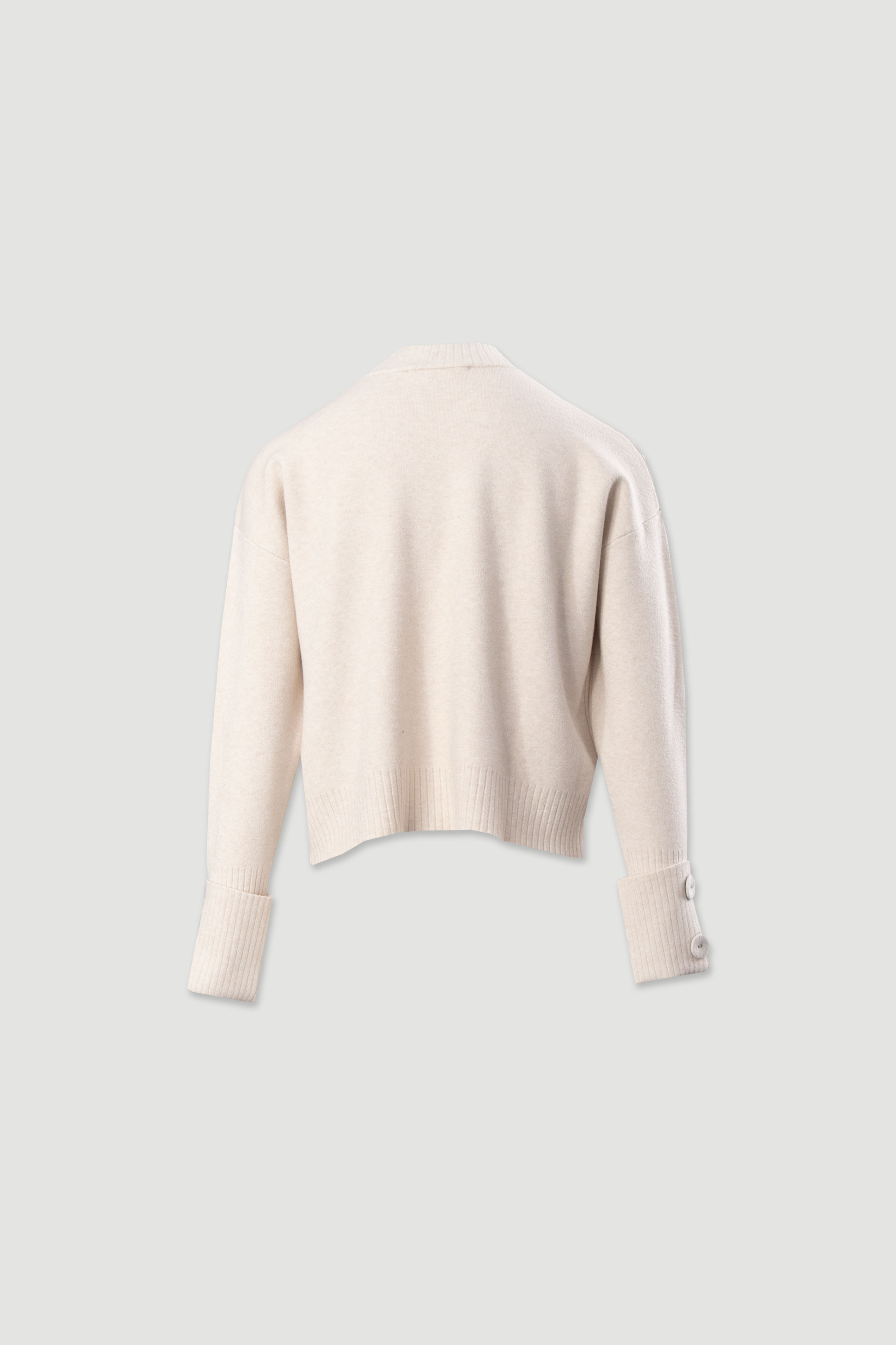 Camisola de malha com botões nos punhos