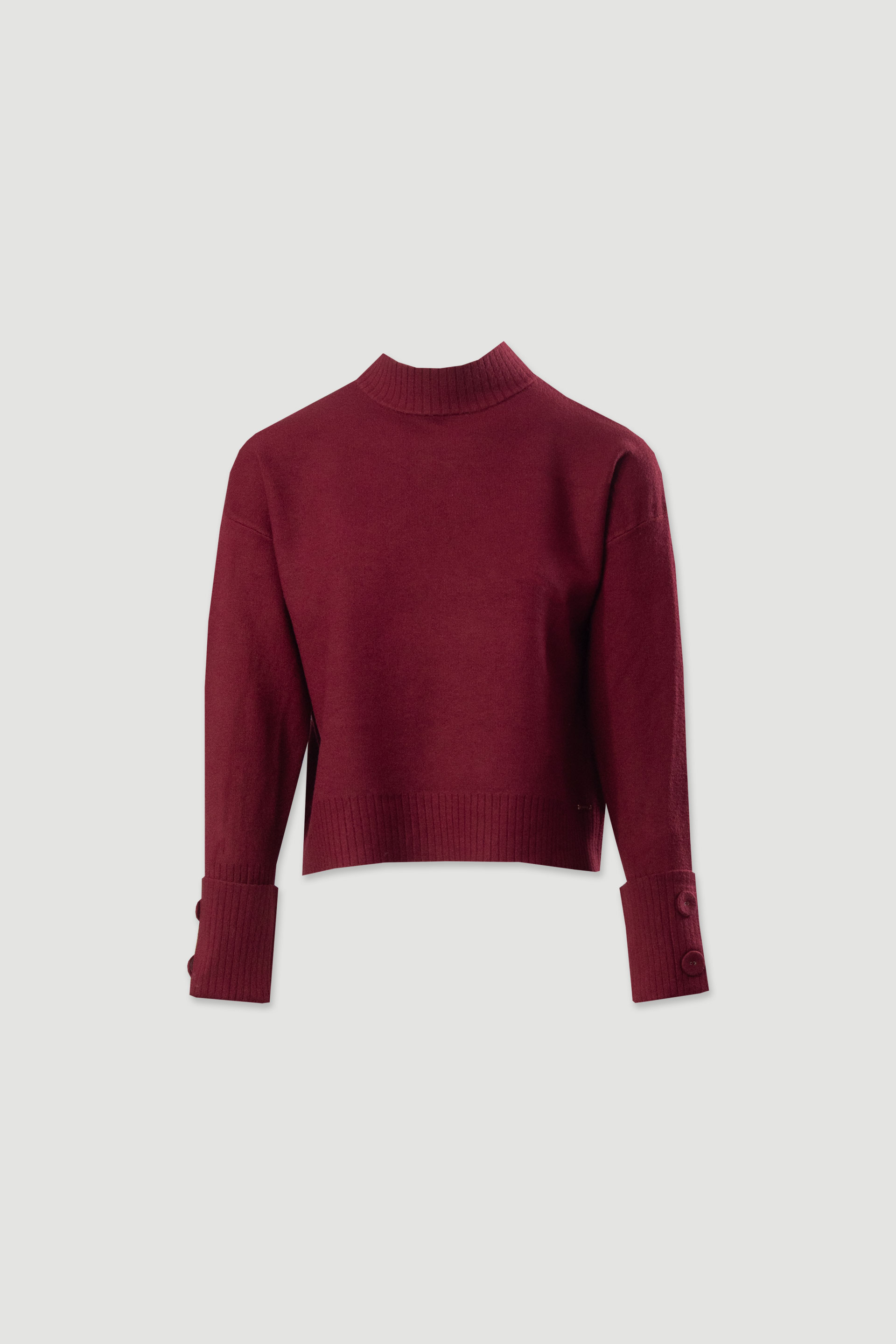 Pull en maille avec boutons aux poignets