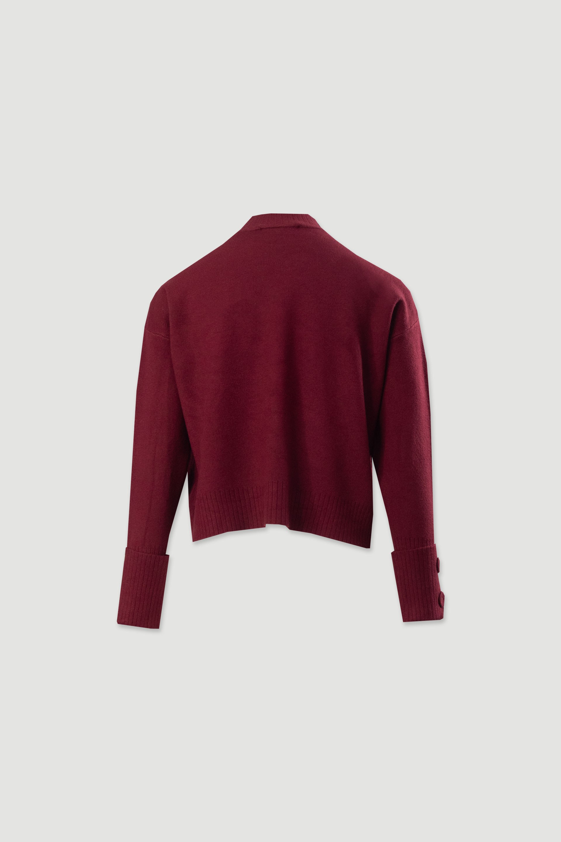 Pull en maille avec boutons aux poignets