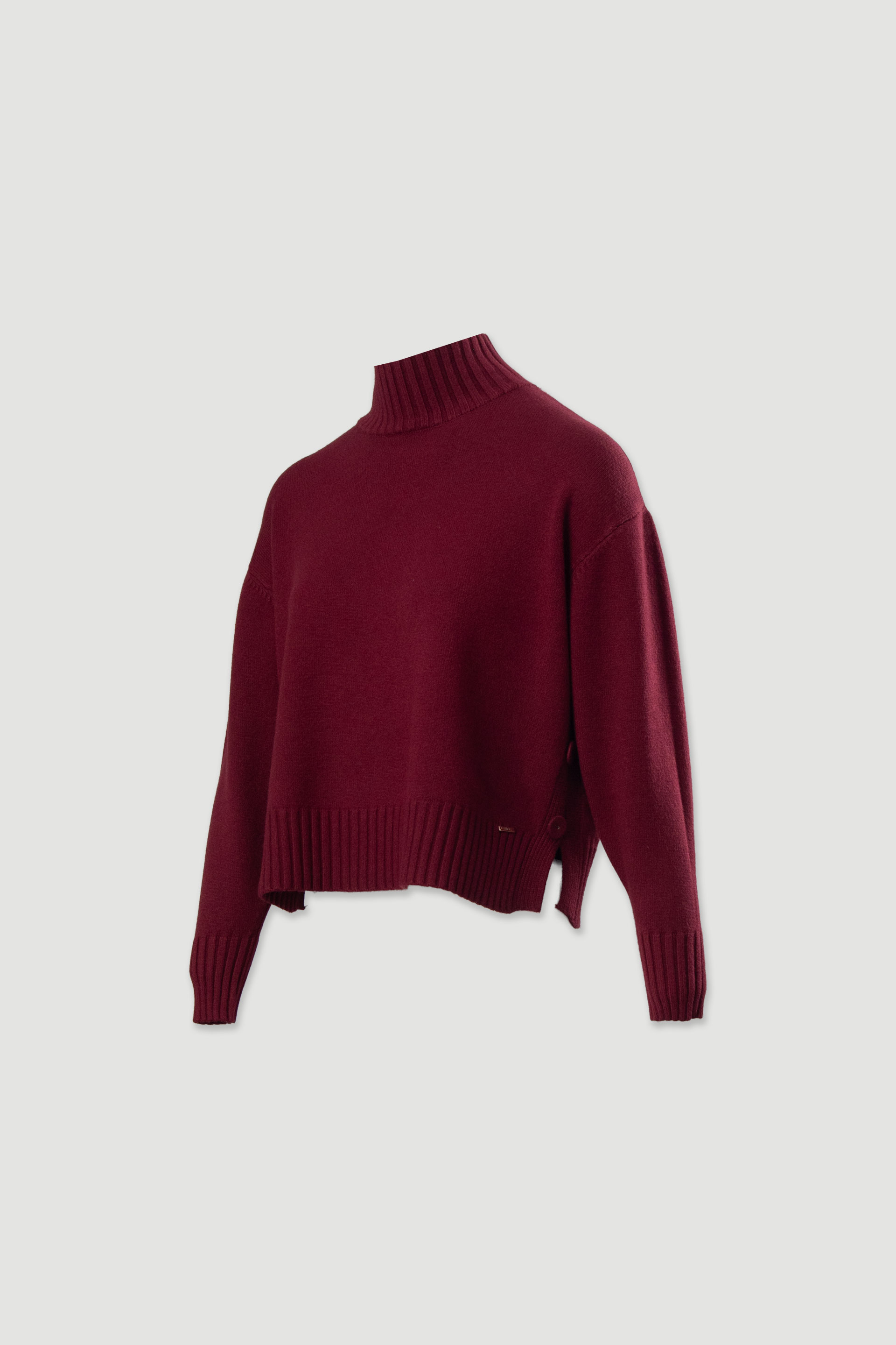 Camisola de malha com gola subida e botões laterais