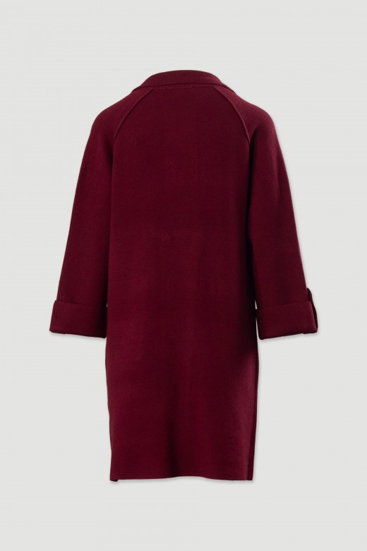 Manteau long en maille avec poches avant Manteau long en maille avec poches avant