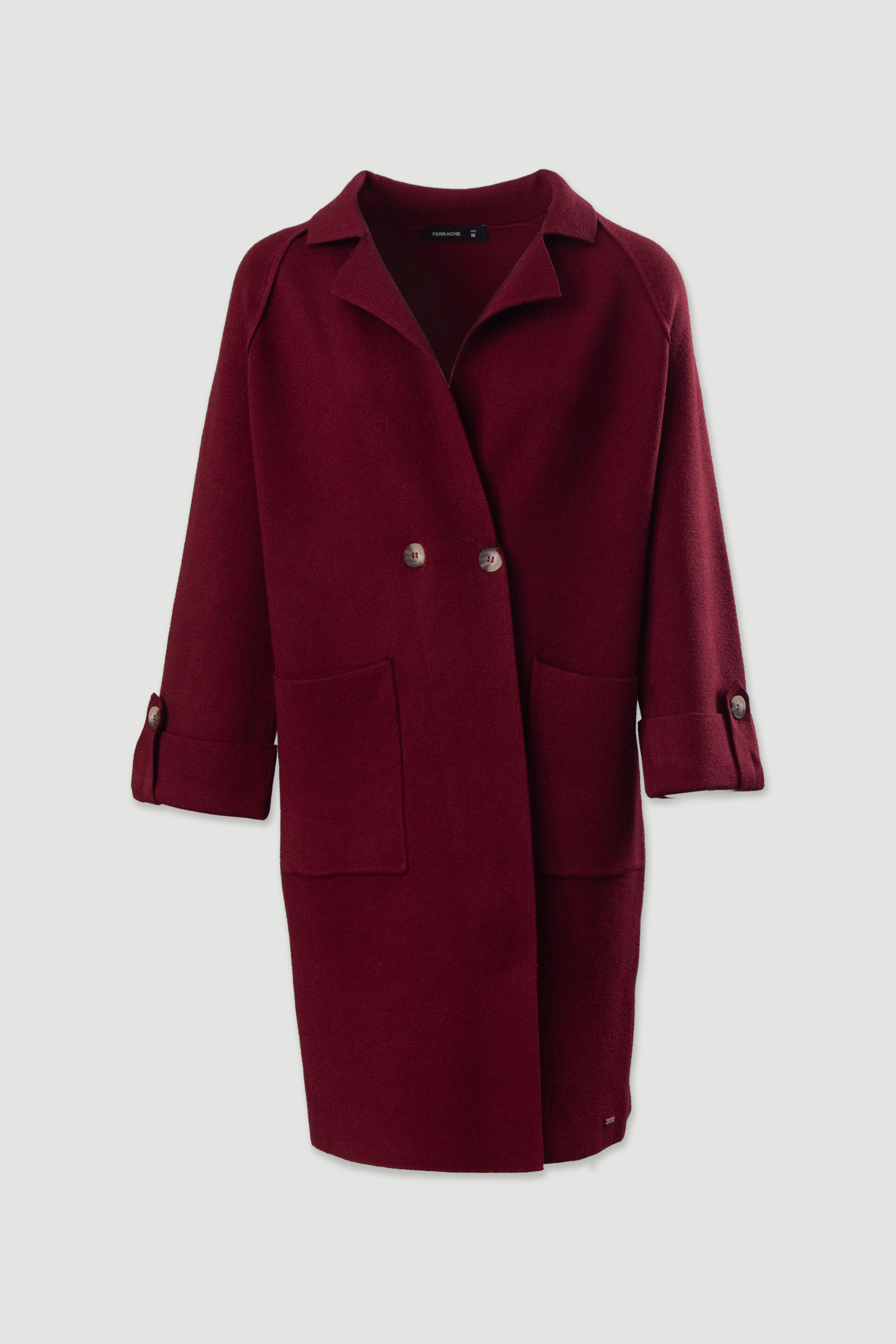 Abrigo largo de punto con bolsillos delanteros