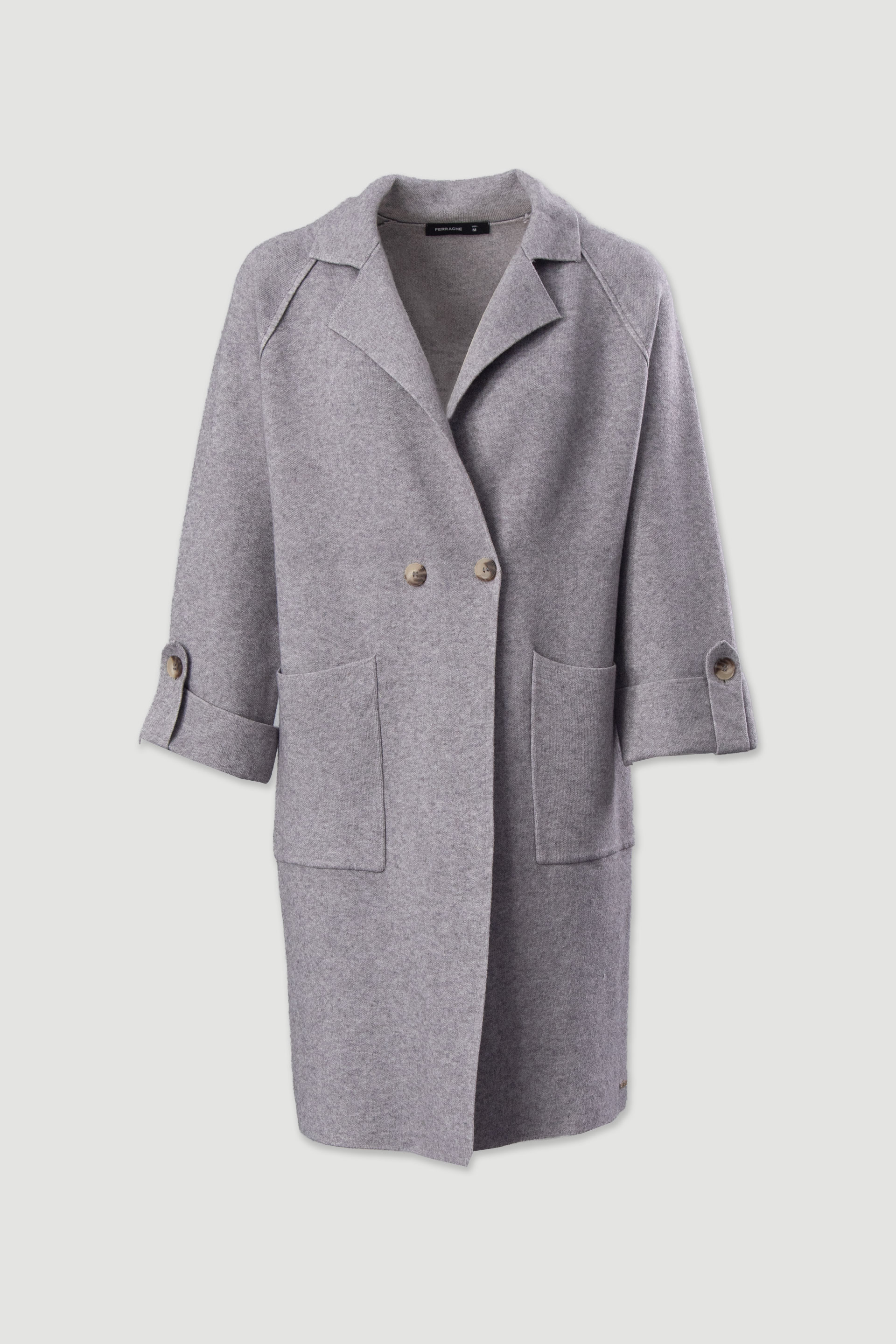Abrigo largo de punto con bolsillos delanteros