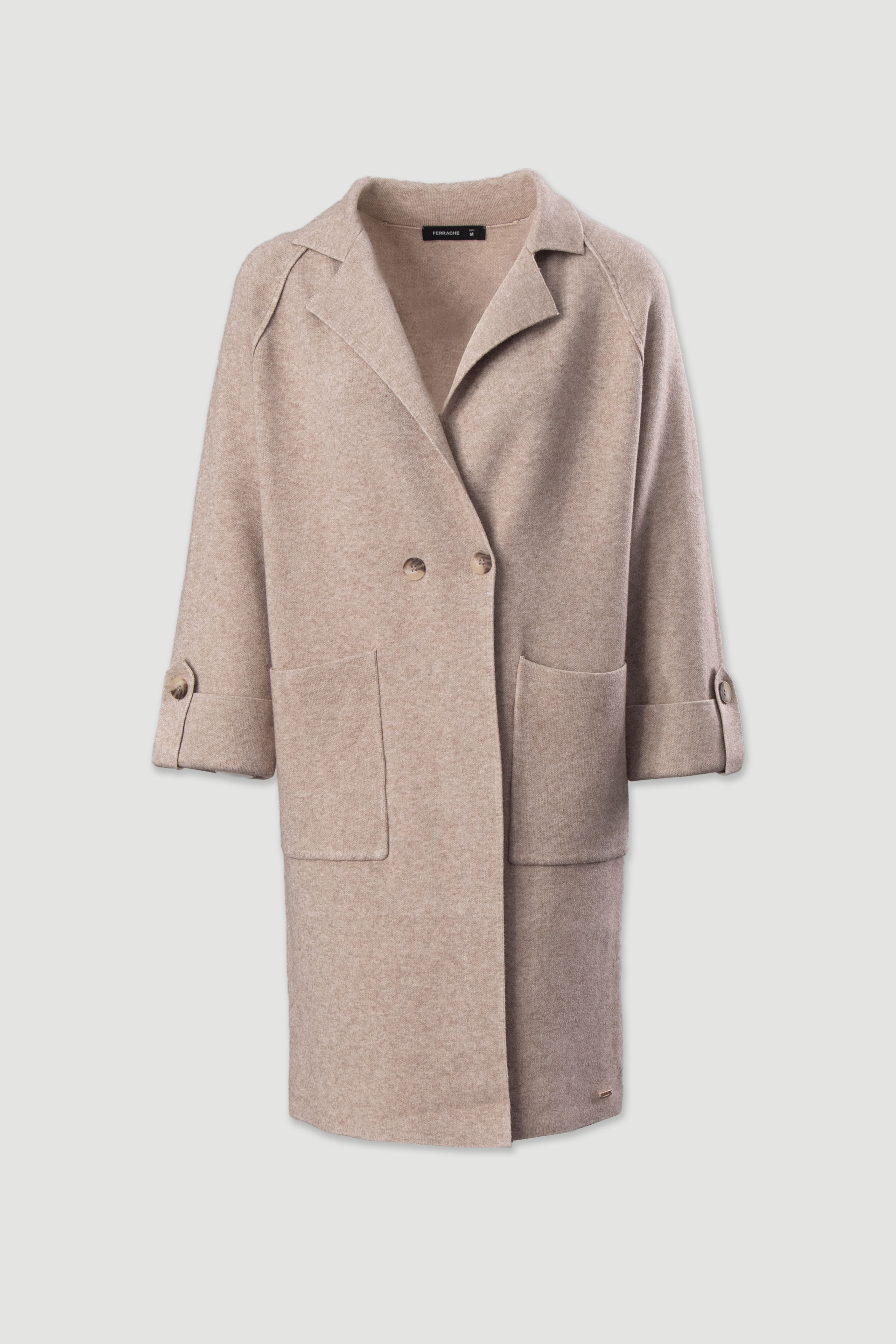 Abrigo largo de punto con bolsillos delanteros