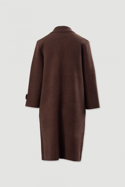 Long knitted coat with buttons Long knitted coat with buttons