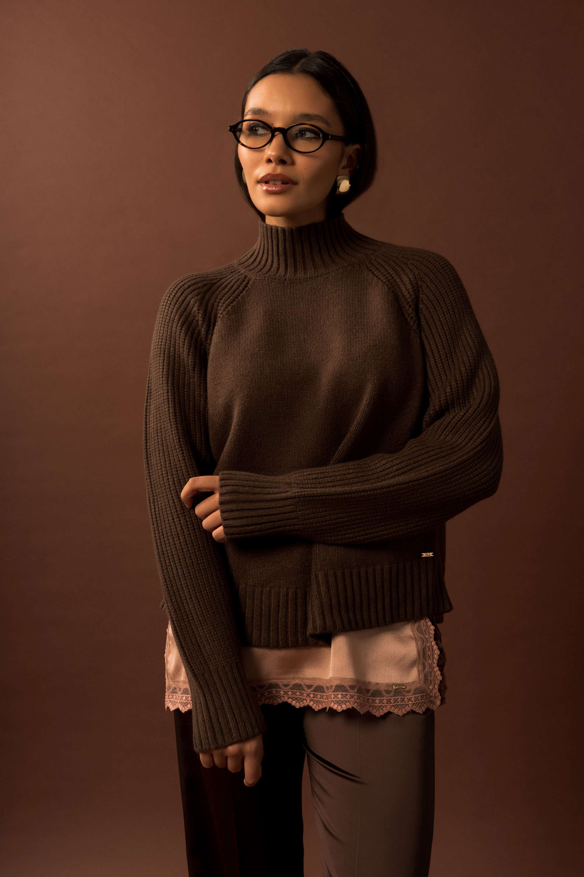 Camisola de malha canelada com gola alta