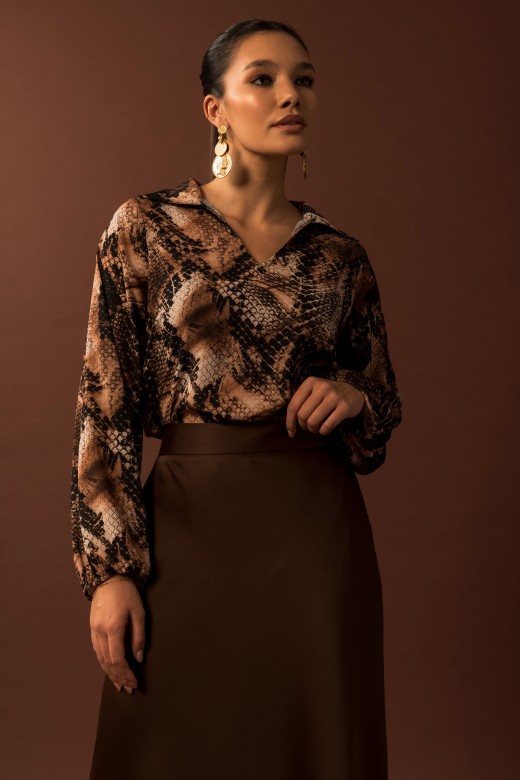 Túnica con estampado animal y escote en v Túnica con estampado animal y escote en v