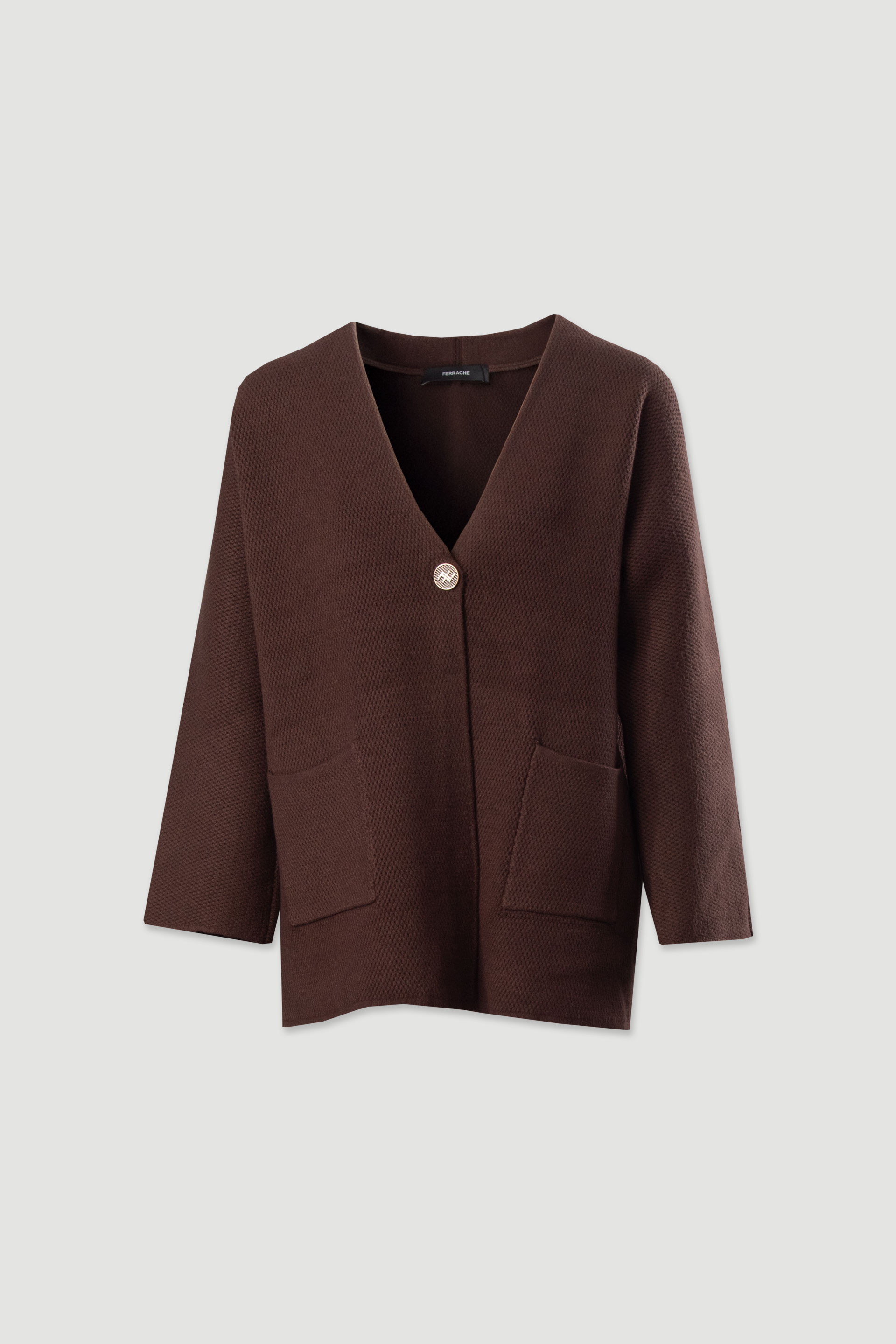 Chaqueta de punto con botón personalizado