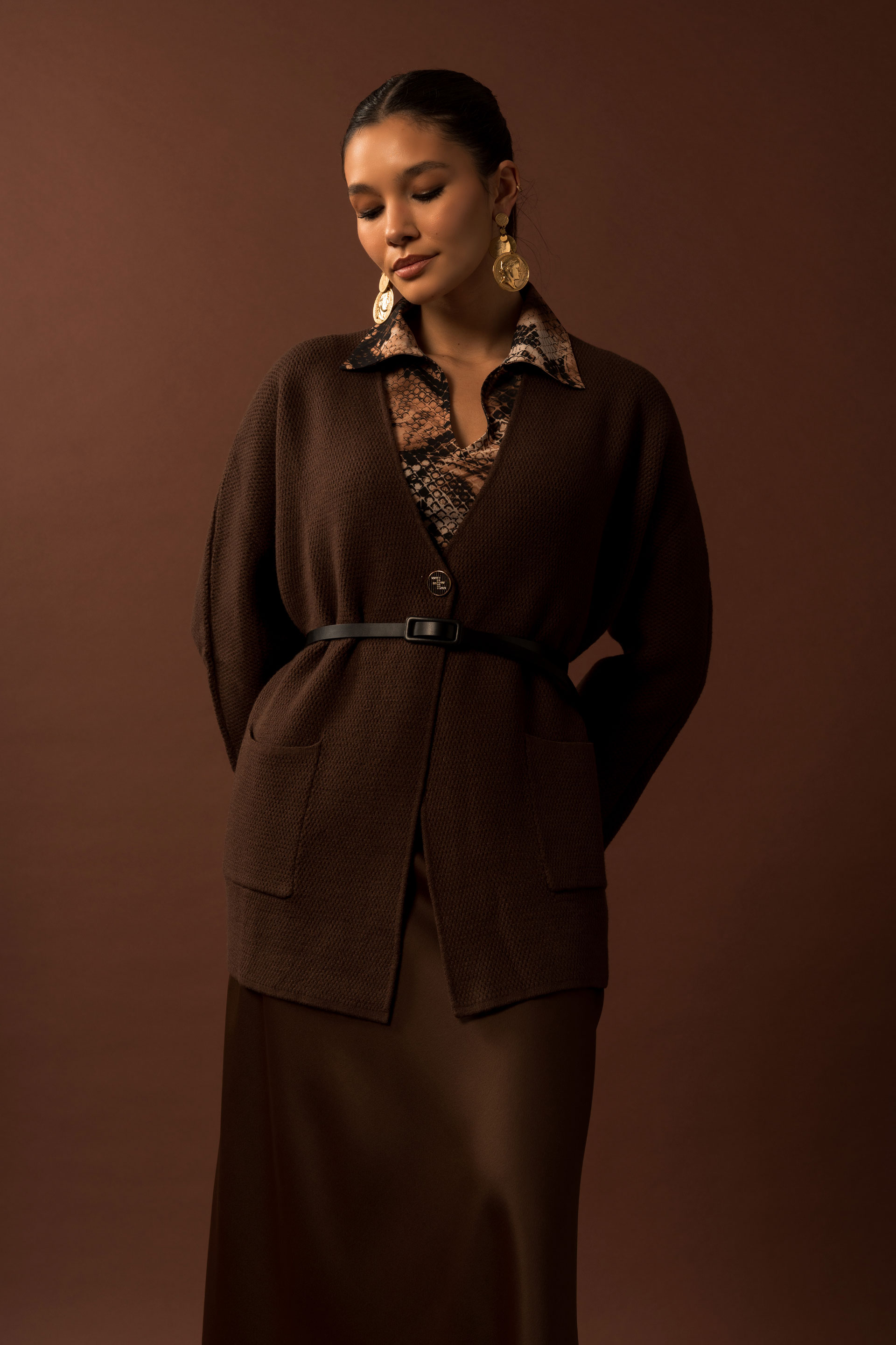 Chaqueta de punto con botón personalizado