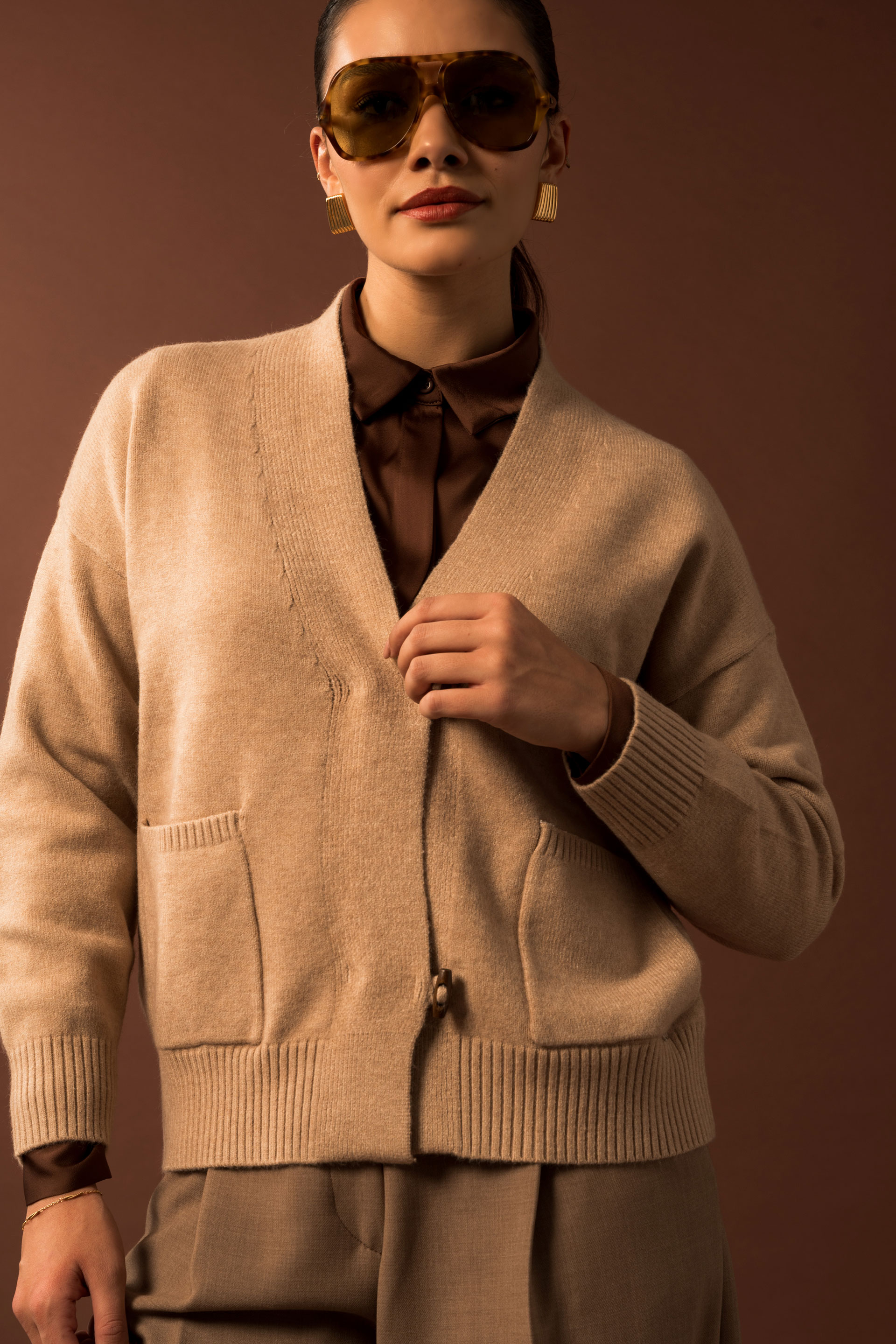 Casaco de malha com bolsos frontais