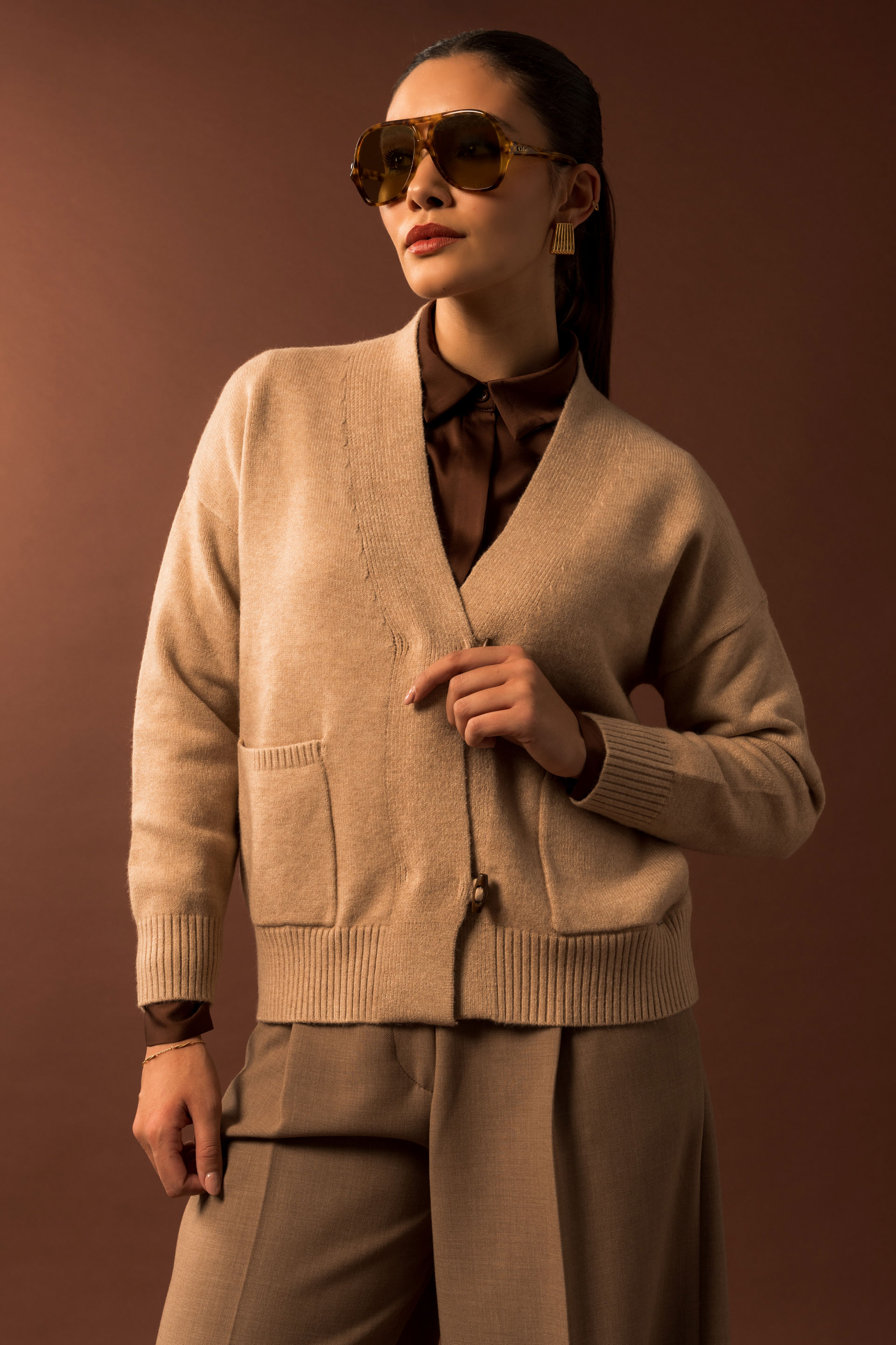 Casaco de malha com bolsos frontais