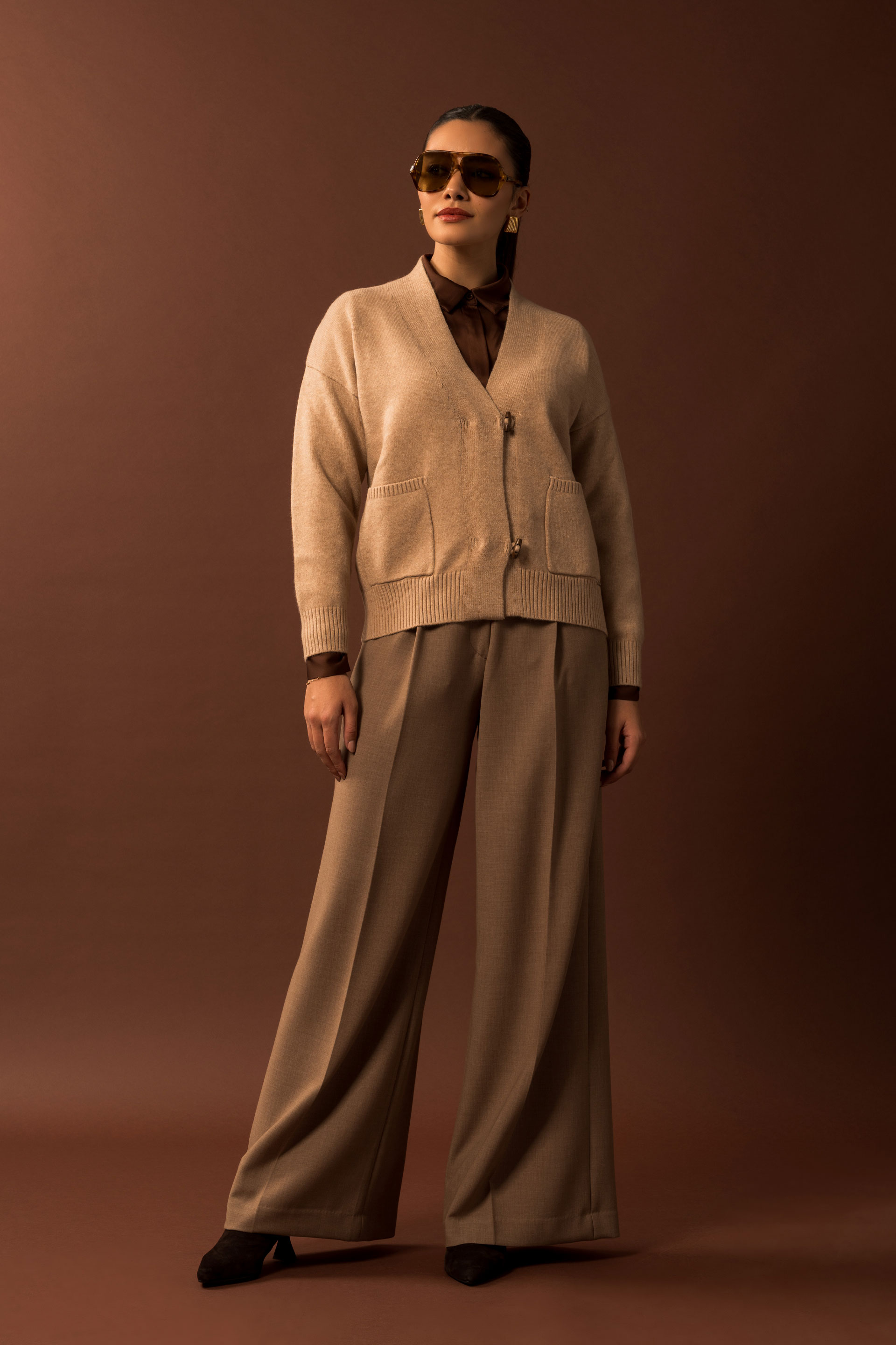 Casaco de malha com bolsos frontais