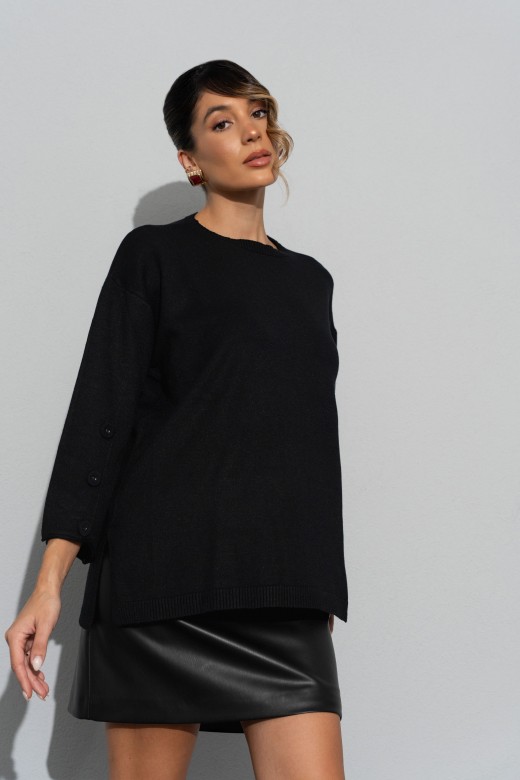 Camisola de malha fluída com botões nas mangas Camisola de malha fluída com botões nas mangas