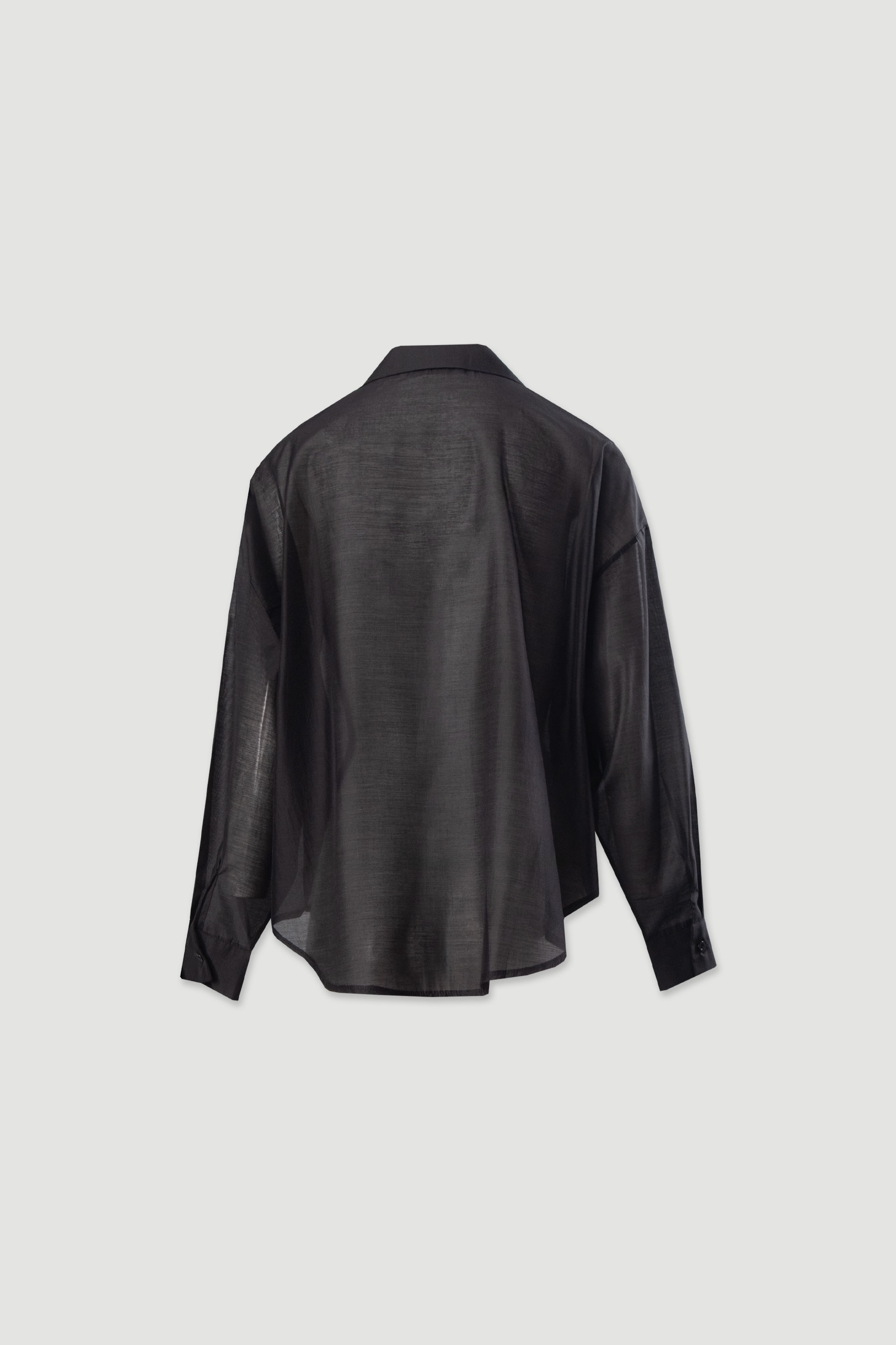 Camisa fluida semitransparente