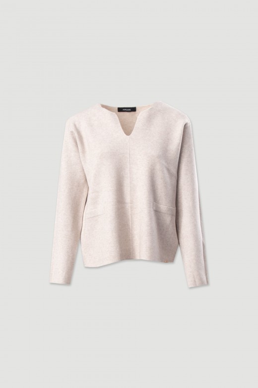 Knitted sweater with v-neckline