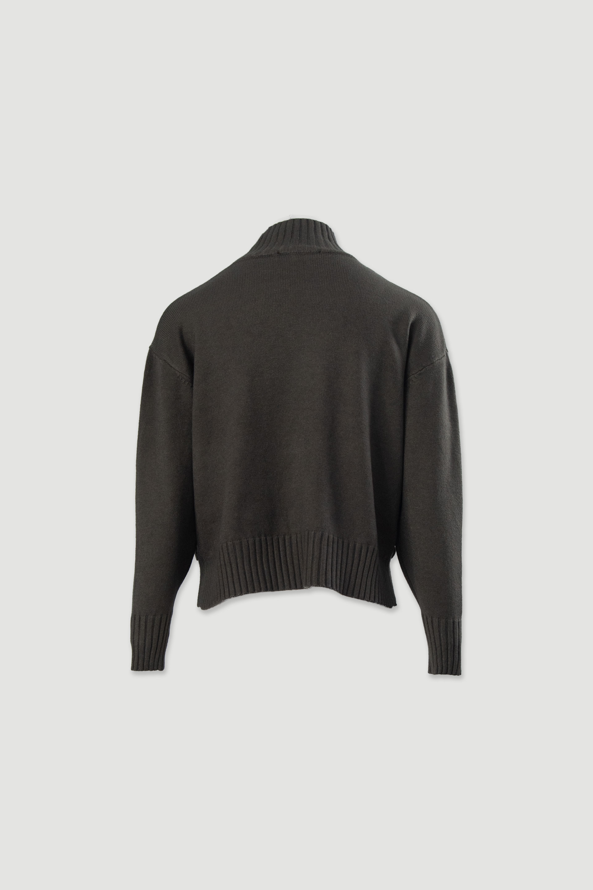 Knit sweater with high neck and side buttons