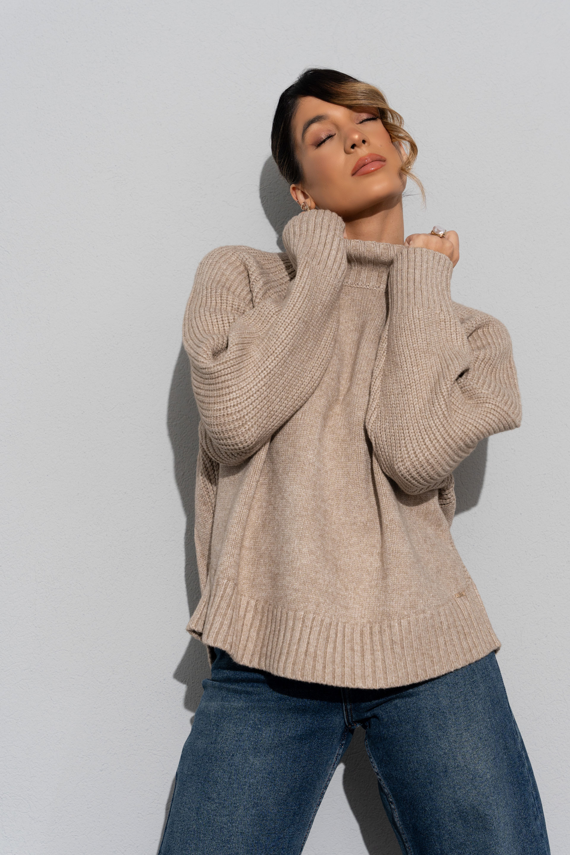 Ribbed knit sweater with high collar