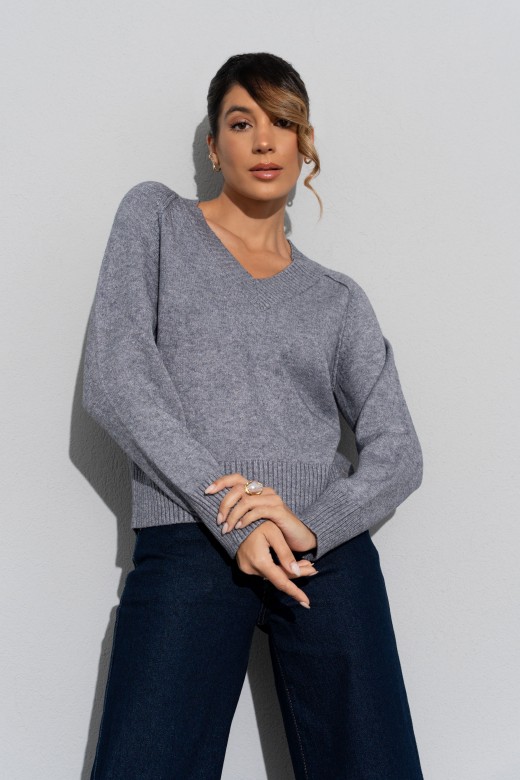 Suter de punto corto con cuello en v