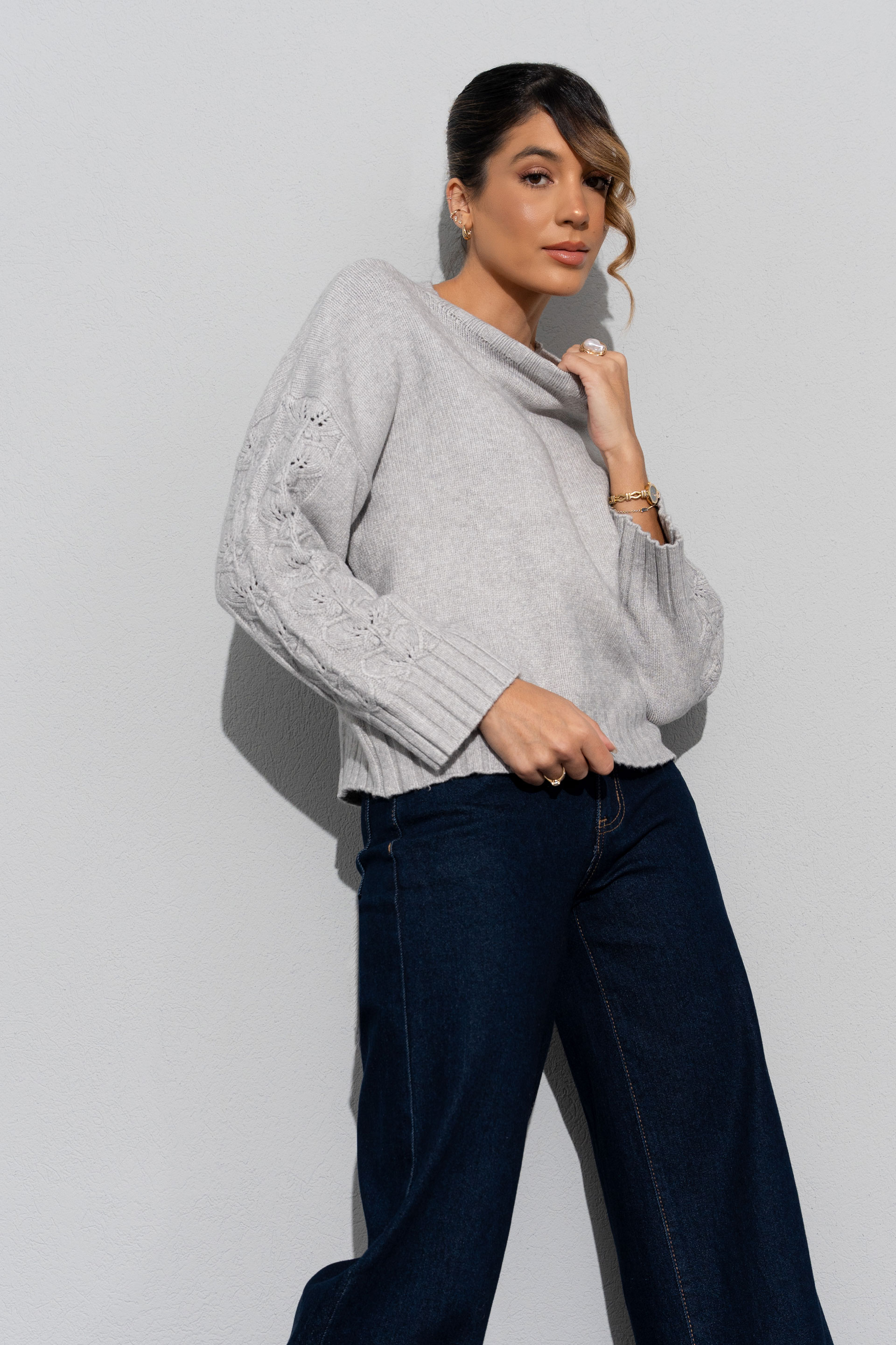 Knit sweater with lace detail on the sleeves