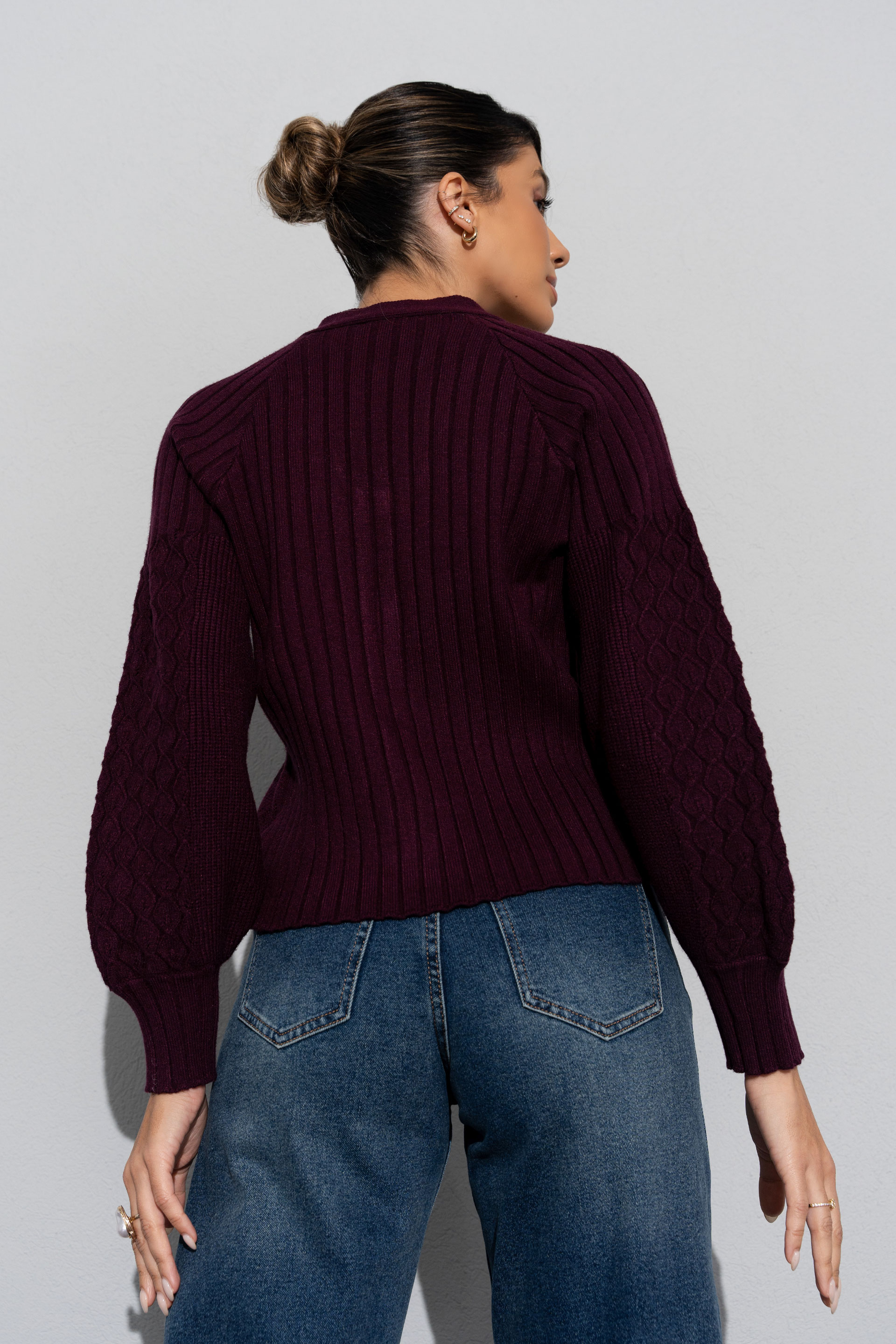 Knit cardigan with textured sleeves