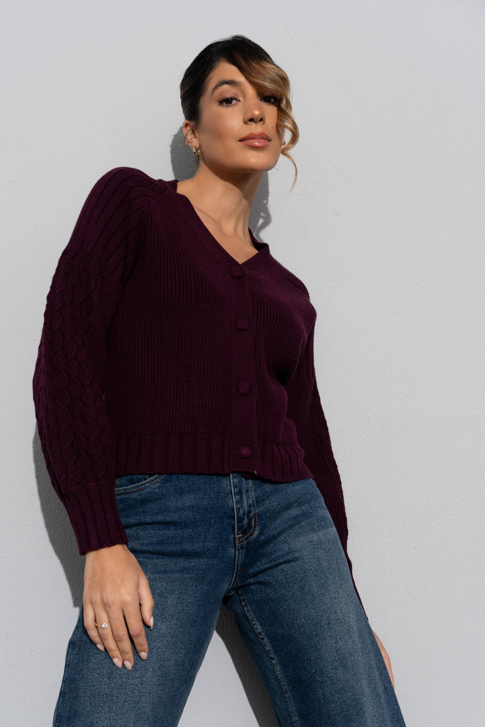 Knit cardigan with textured sleeves