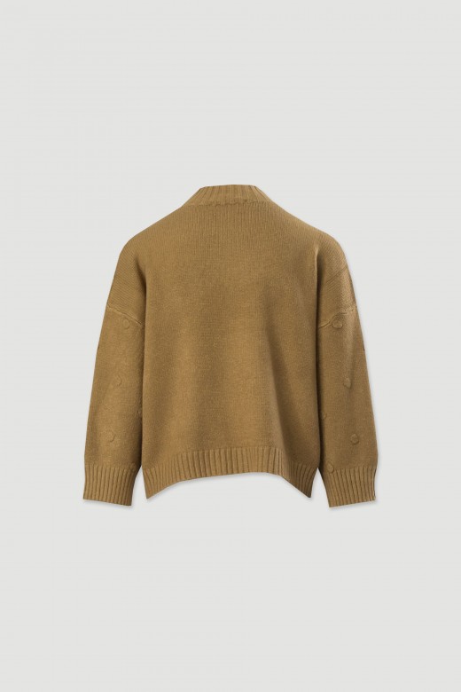 Knitted sweater with textured dots
