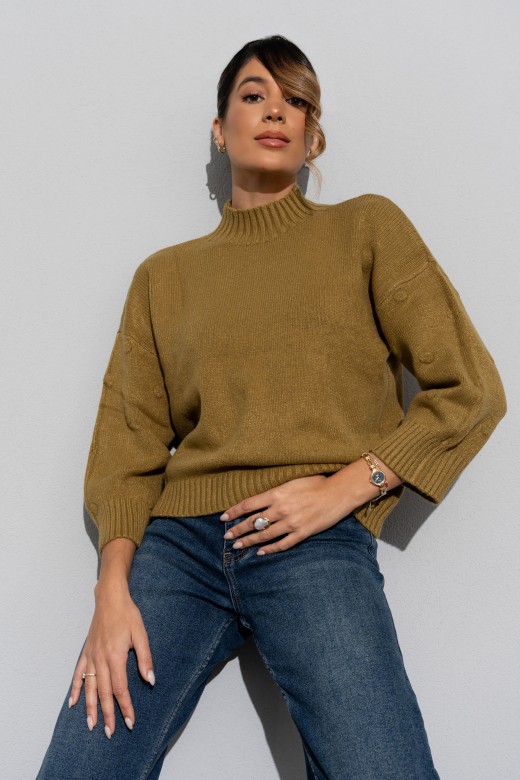 Knitted sweater with textured dots