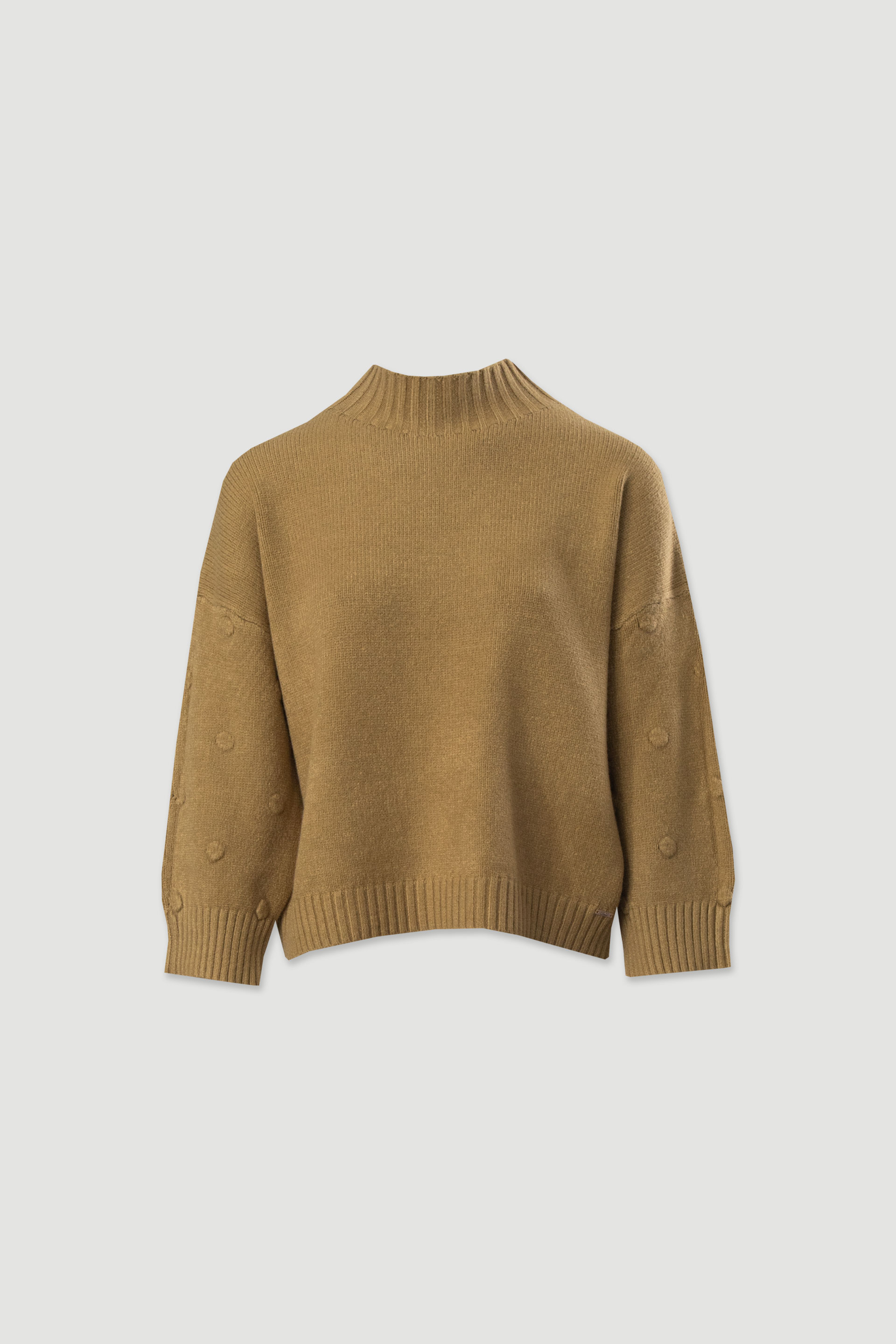 Knitted sweater with textured dots