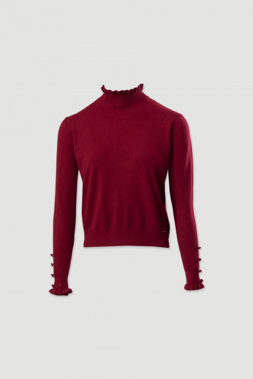 Knit sweater with wavy collar and buttons
