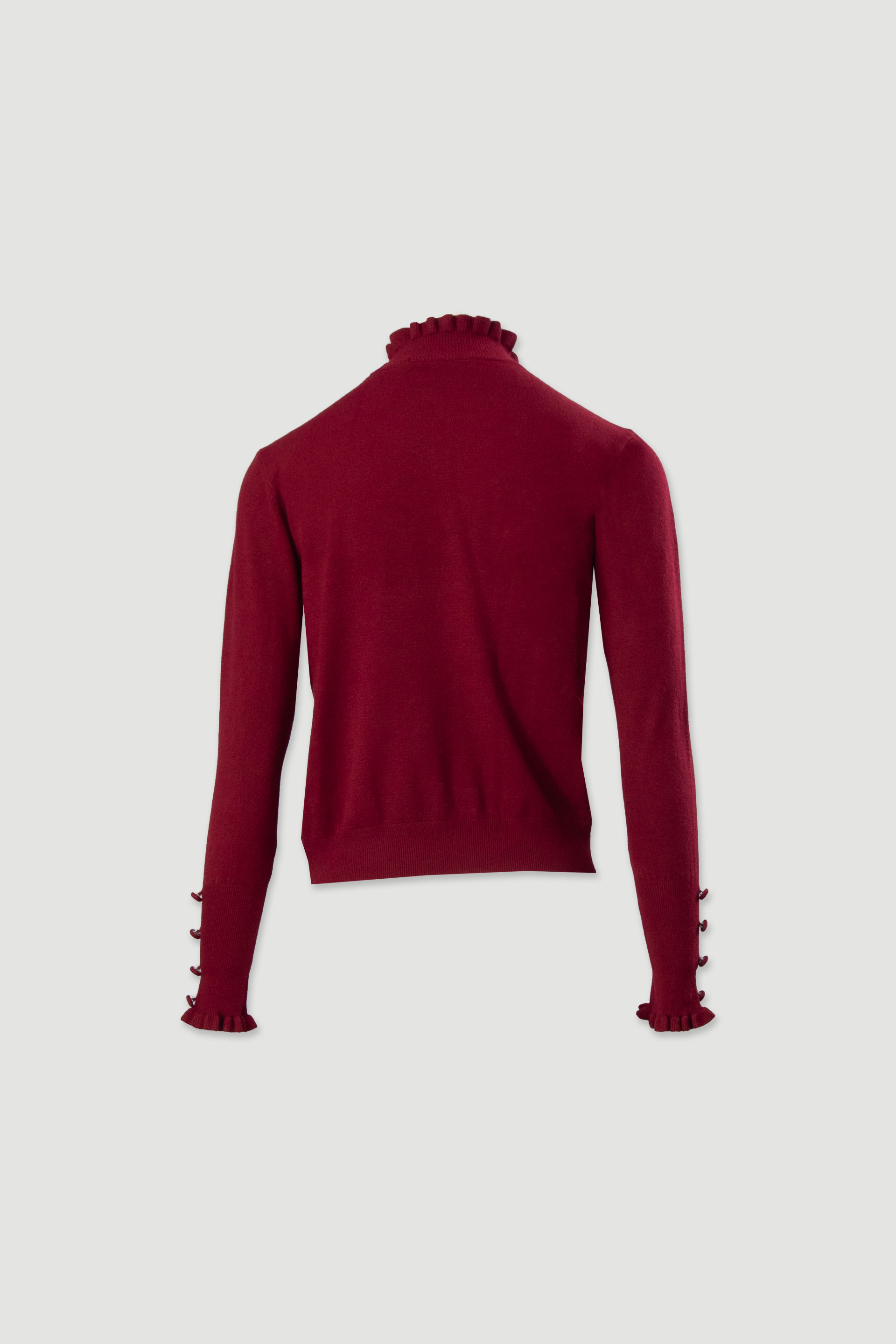 Knit sweater with wavy collar and buttons