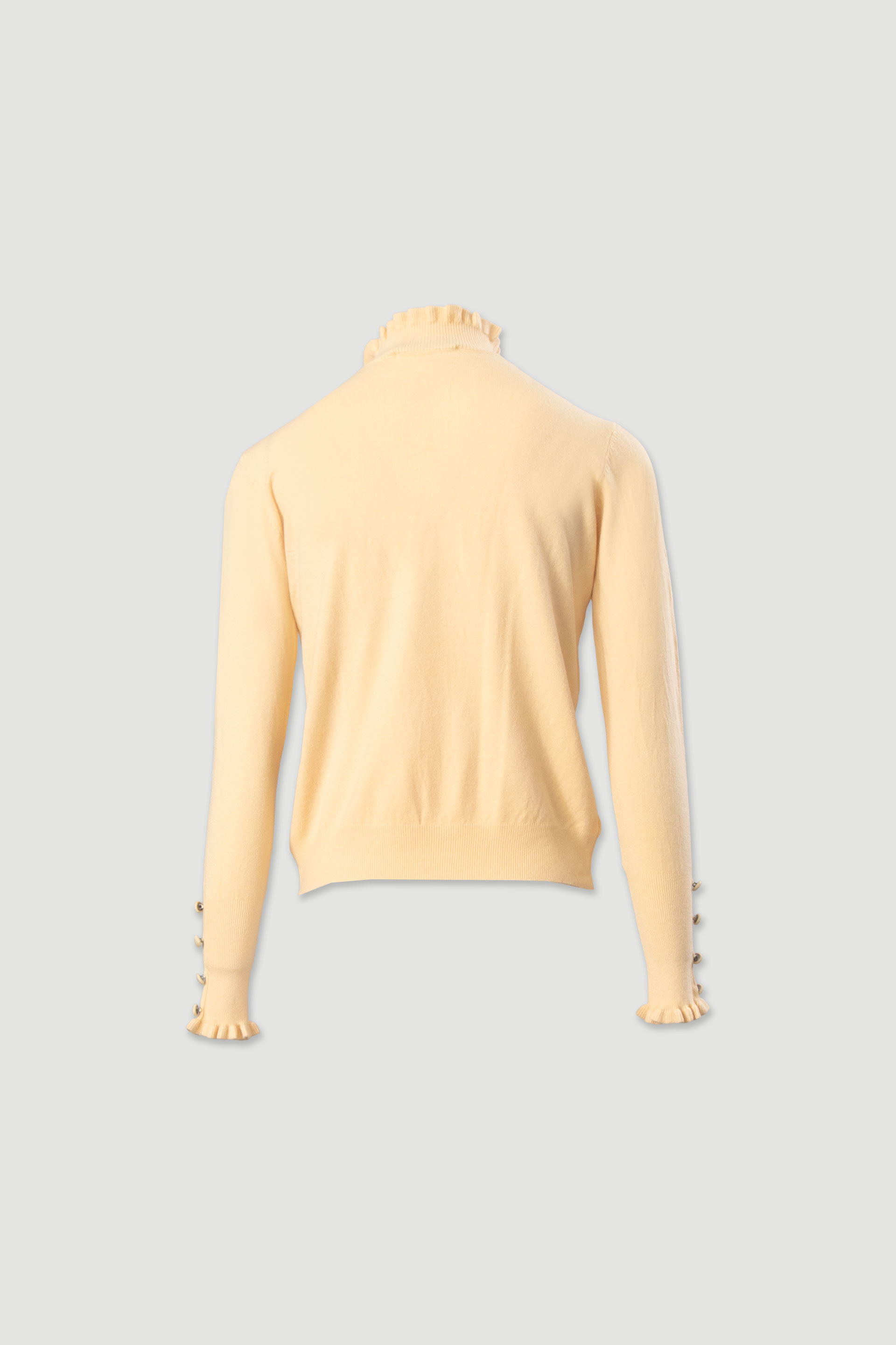 Knit sweater with wavy collar and buttons