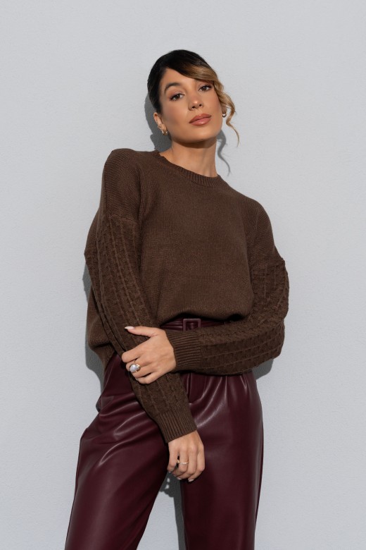 Knitted jumper with textured sleeves