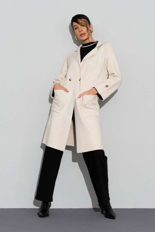 Long knit coat with front pockets