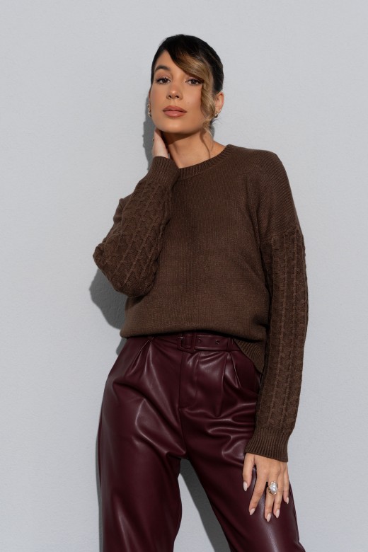 Knitted jumper with textured sleeves