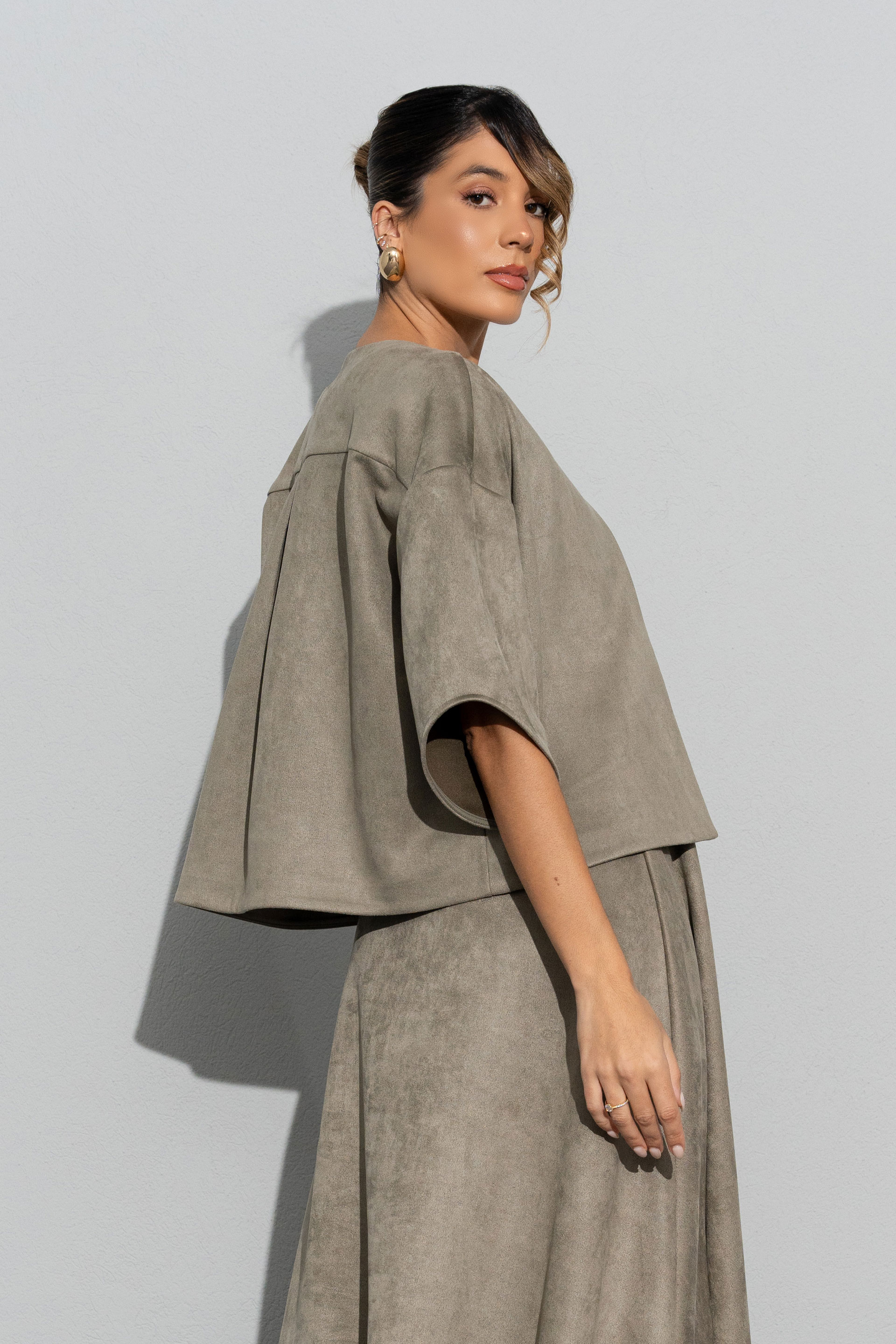 Short jacket in peach skin effect fabric