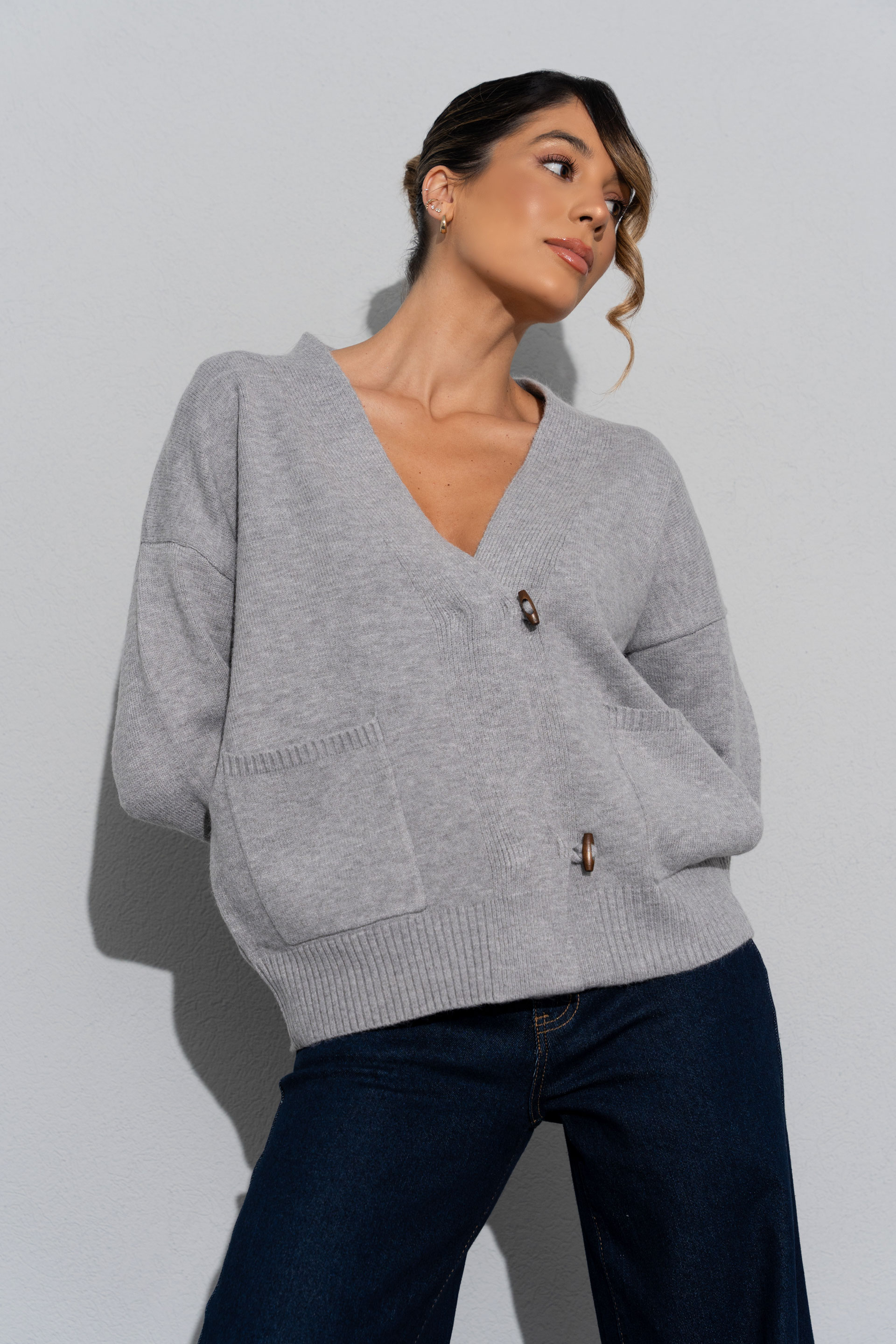 Casaco de malha com bolsos frontais