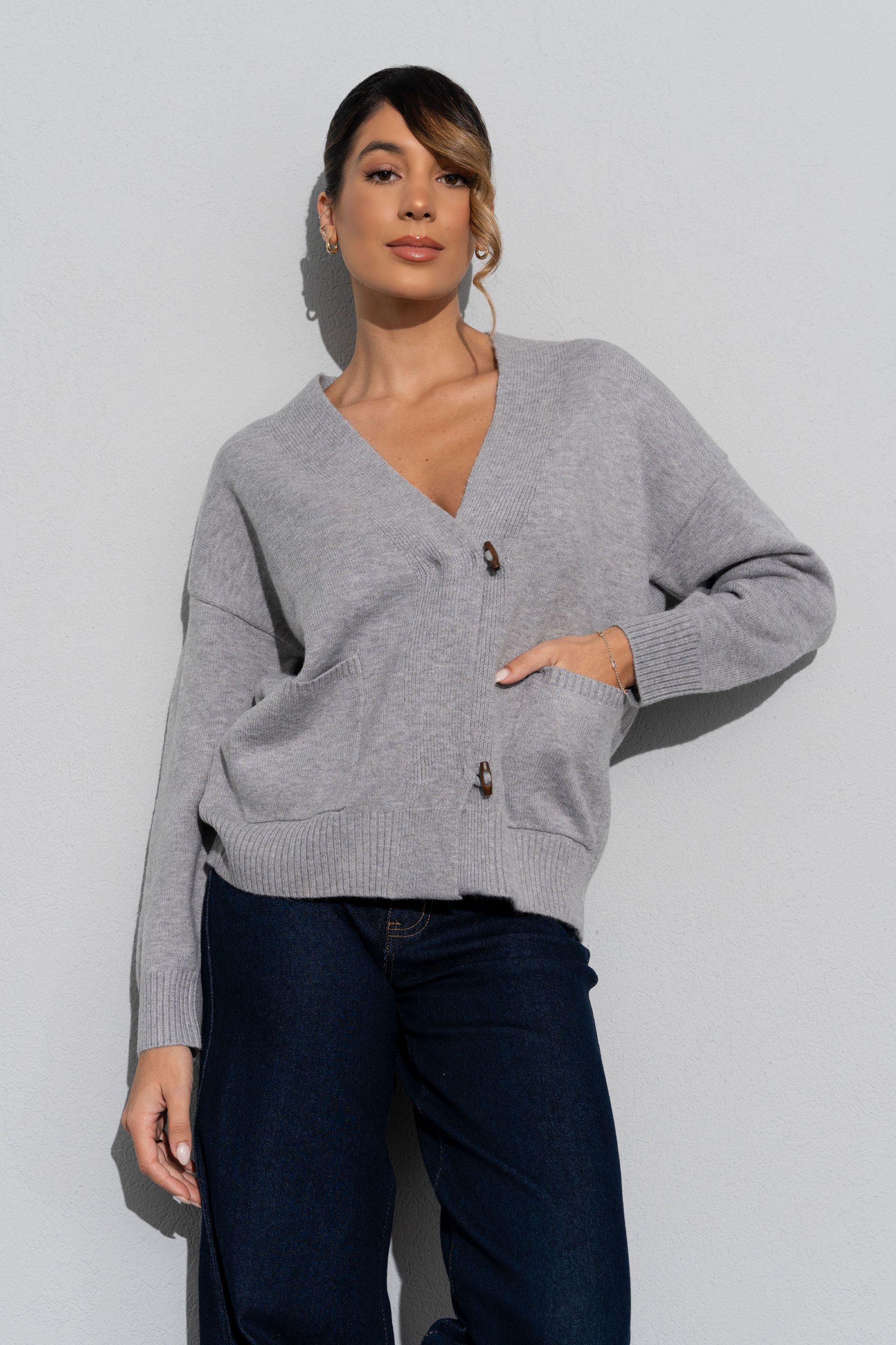 Casaco de malha com bolsos frontais