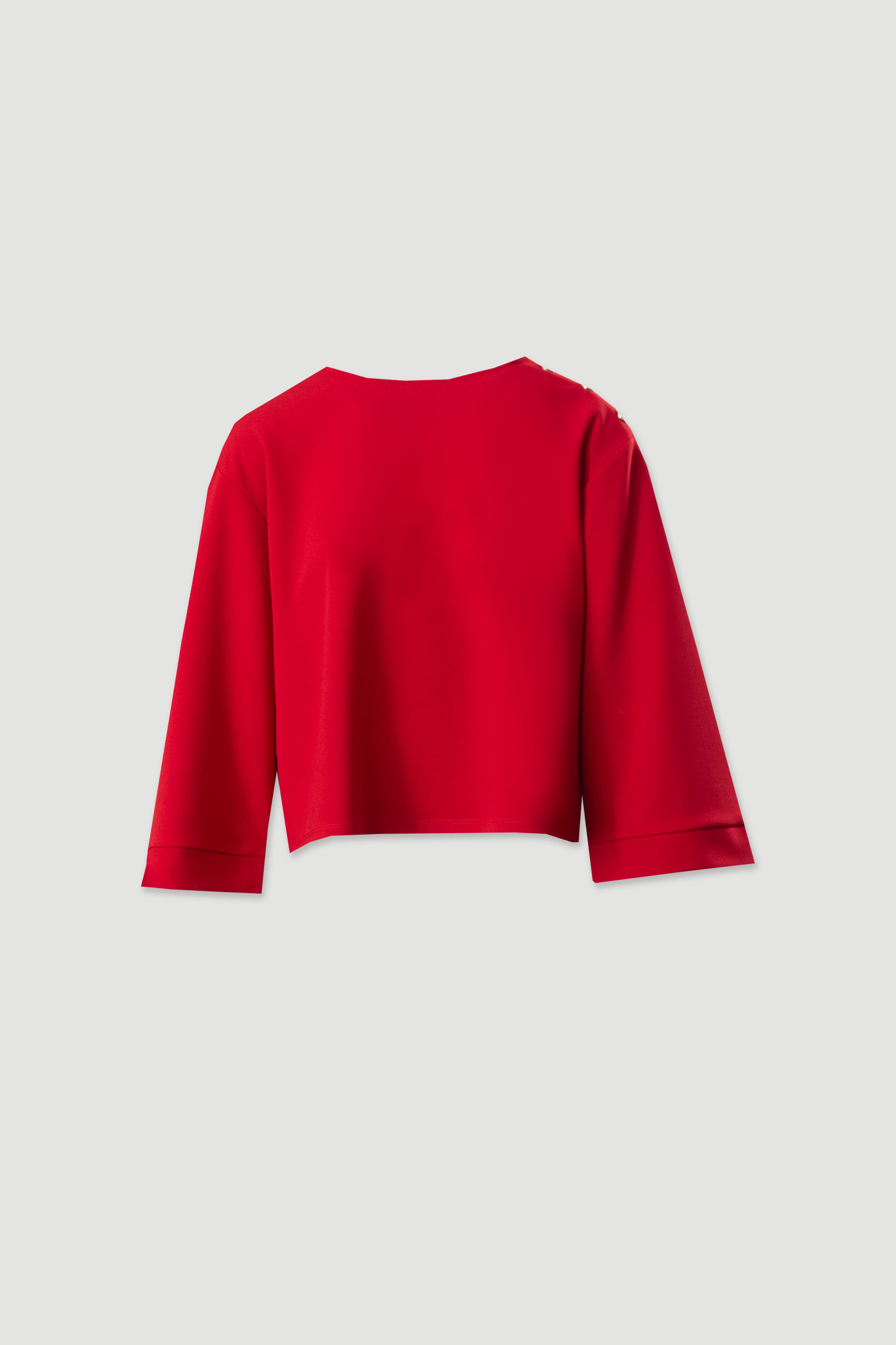 Camisola curta com botões no ombro