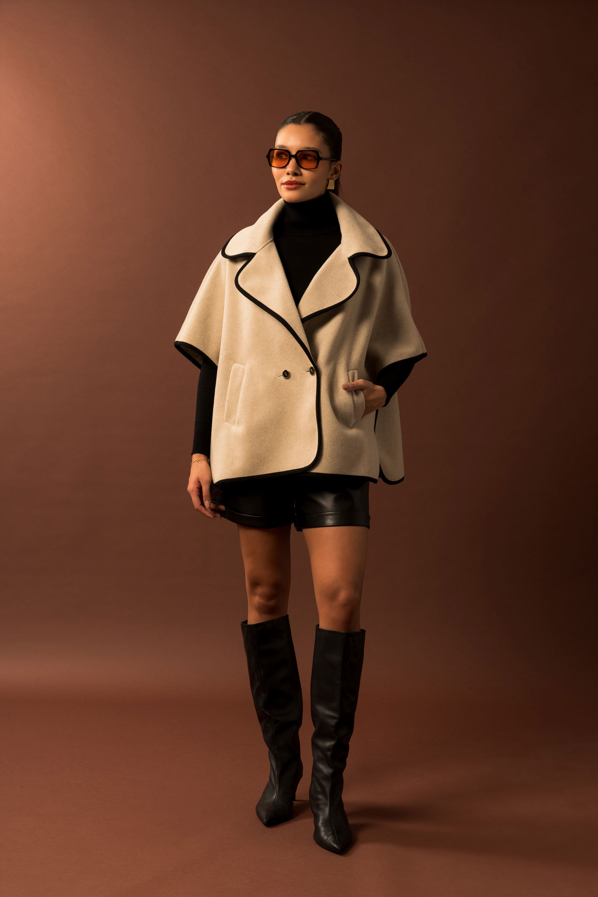 Cape with personalized button