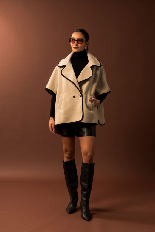 Cape with personalized button