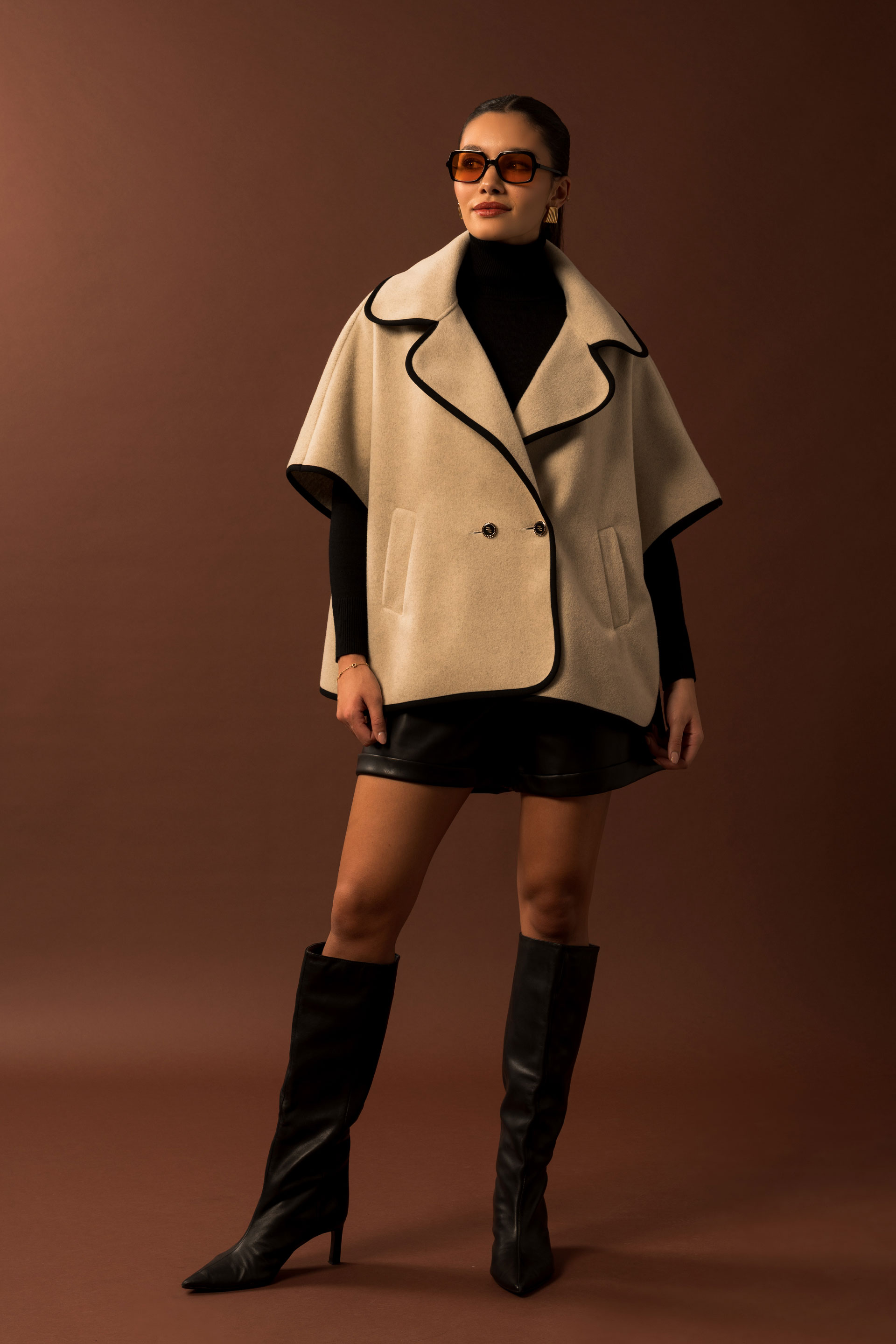 Cape with personalized button