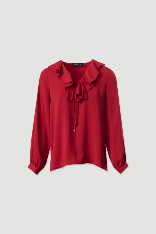 Blouse with ruffle and tie neckline Blouse with ruffle and tie neckline